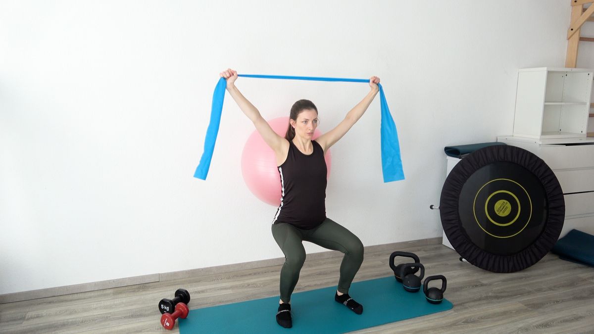Squat With Swiss Ball & Elastic Band