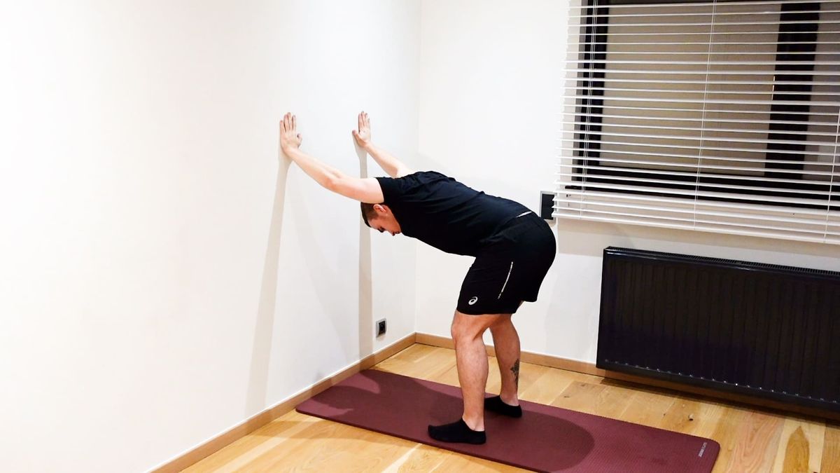 Mobilisation flexion active contre mur