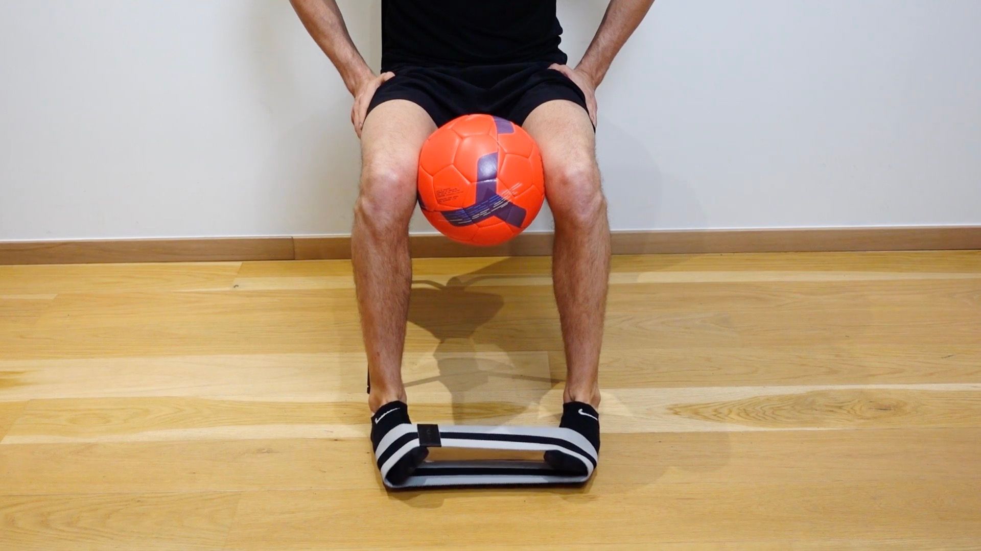ABD Strengthening With Elastic & Ball Between Knees, view 1