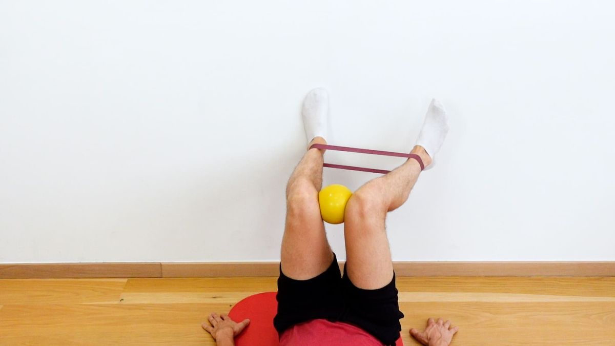 Supine Hip Internal Rotation Strengthening With Elastic Band