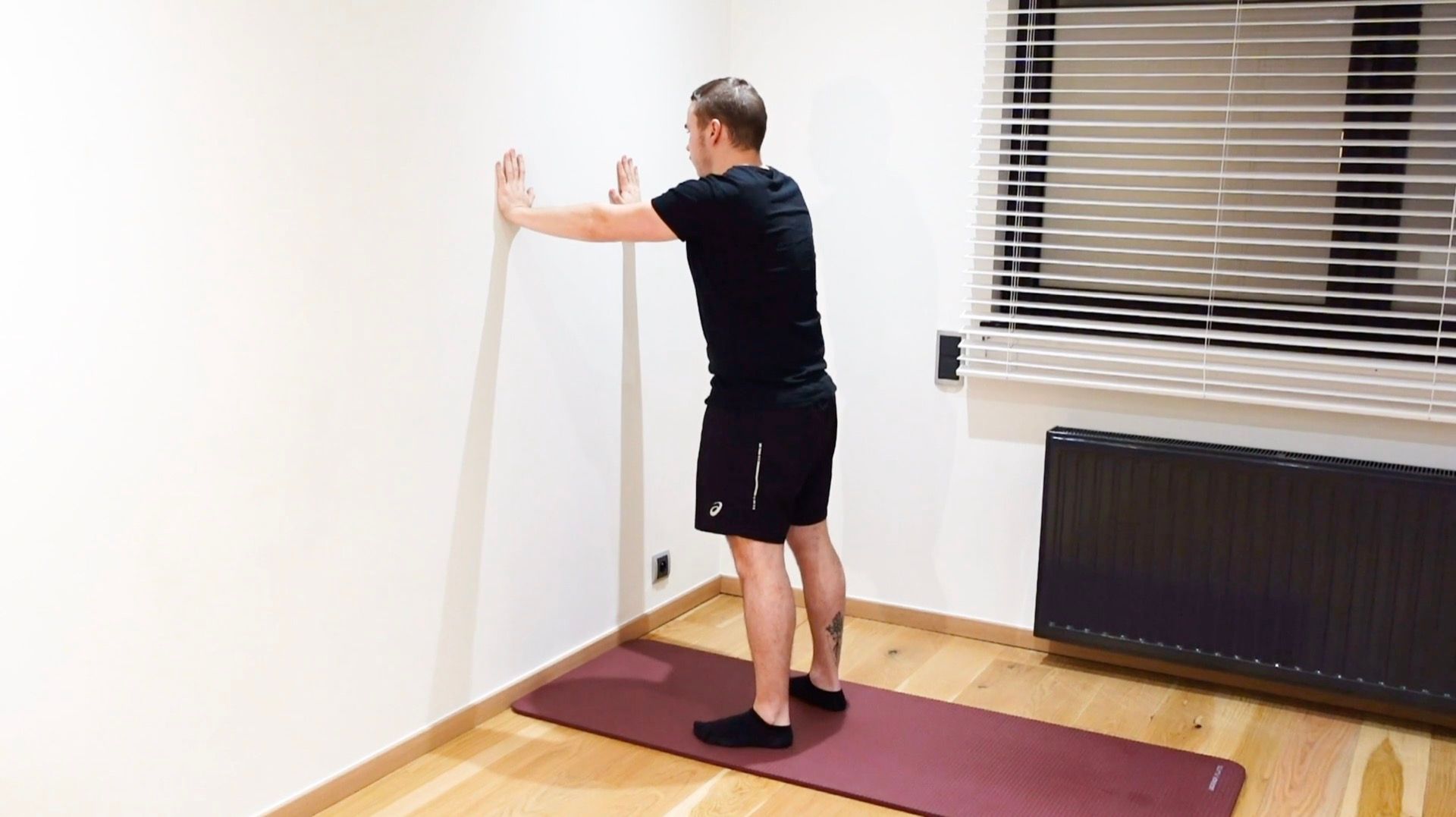 Active Extension Mobilization Against Wall, view 2
