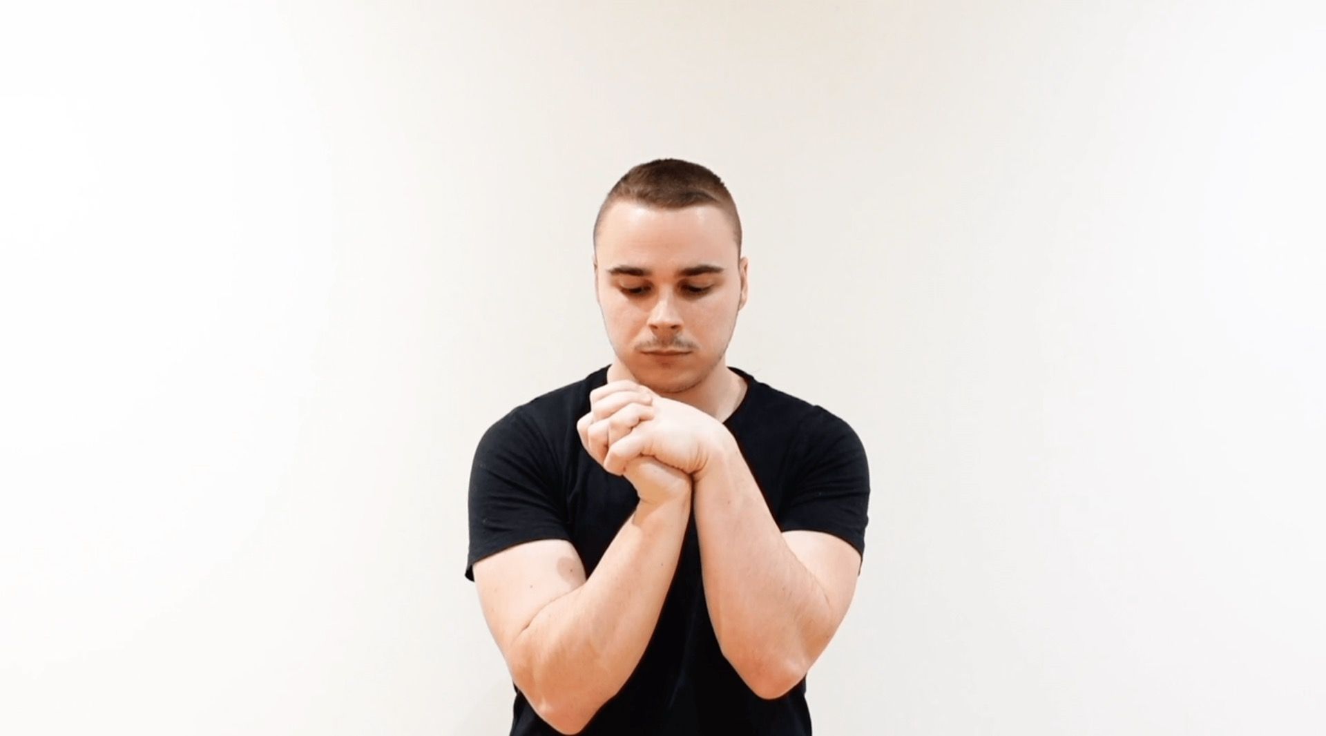Wrist Flexion / Extension Mobilization With Interlaced Fingers, view 1