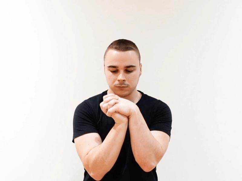 Wrist Flexion / Extension Mobilization With Interlaced Fingers, view 1