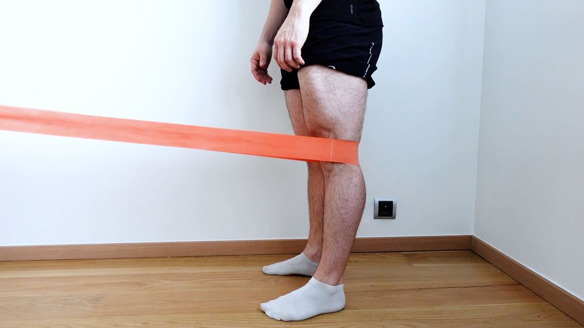 Extension terminale du genou debout avec élastique