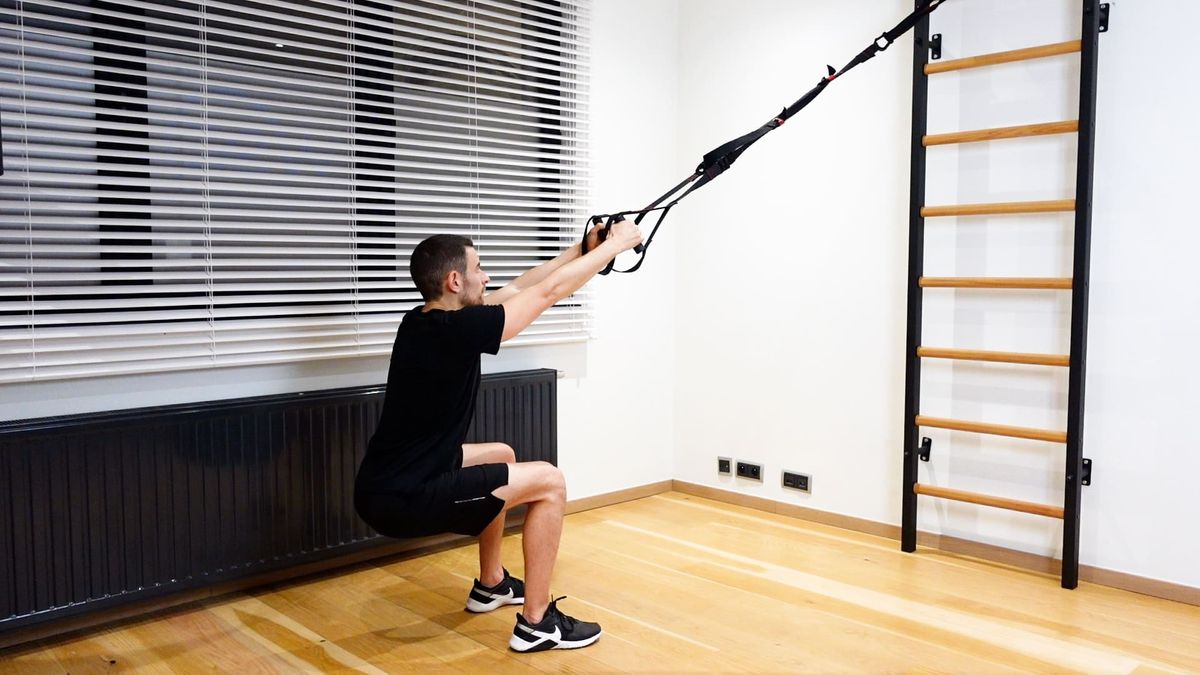 Squat With TRX