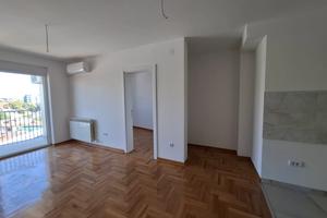 Svetao i funkcionalan stan u novogradnji u centru grada – 63 m² 3