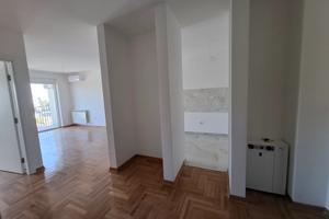 Svetao i funkcionalan stan u novogradnji u centru grada – 63 m² 2