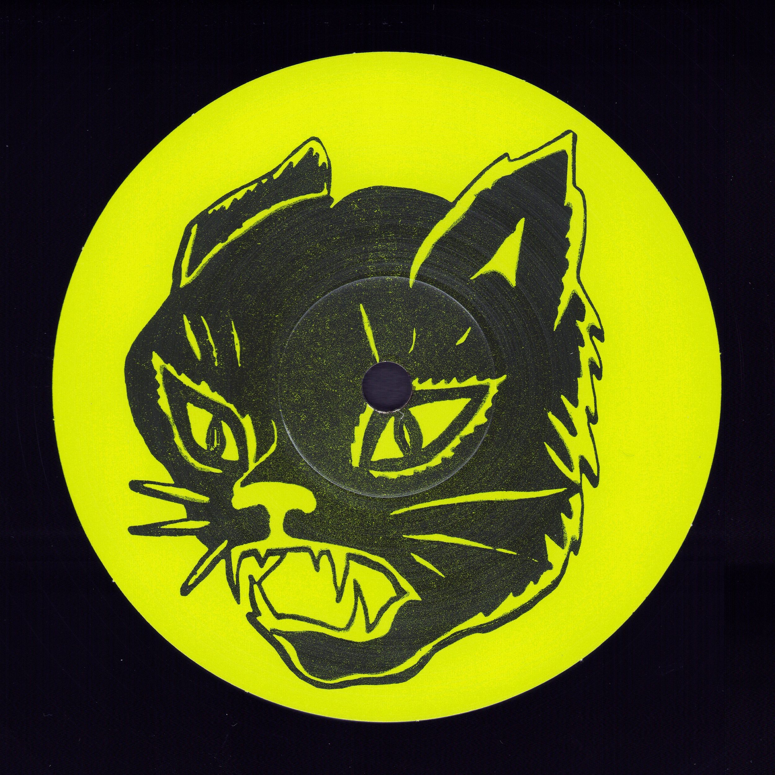 WYFSTW Vinyl Label side A: neon lime green record with bold black snarling cat face, black bg