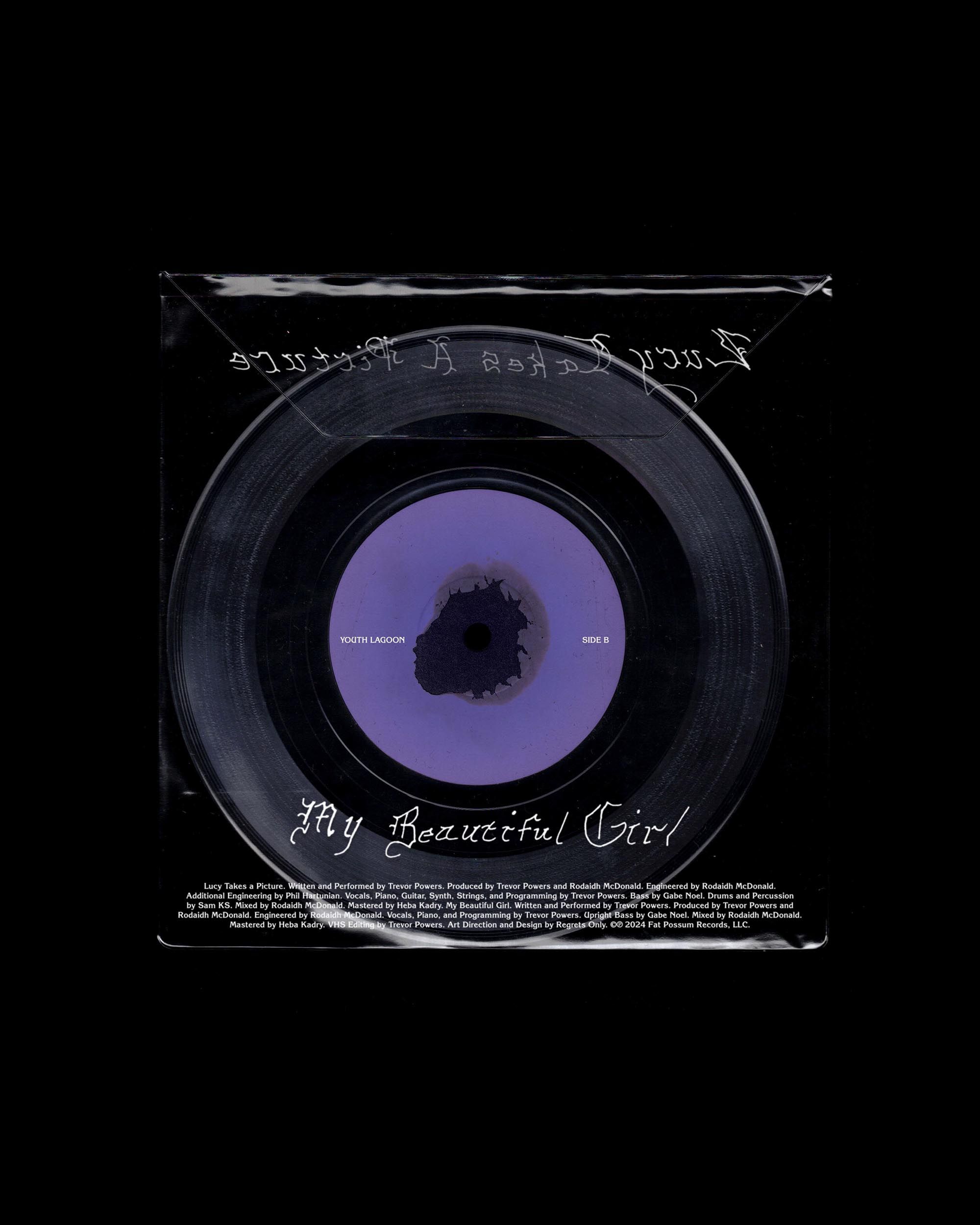 Youth Lagoon "My Beautiful Girl" 7-inch vinyl, Side B. Purple label with burn mark graphic. Art direction by Regrets Only.