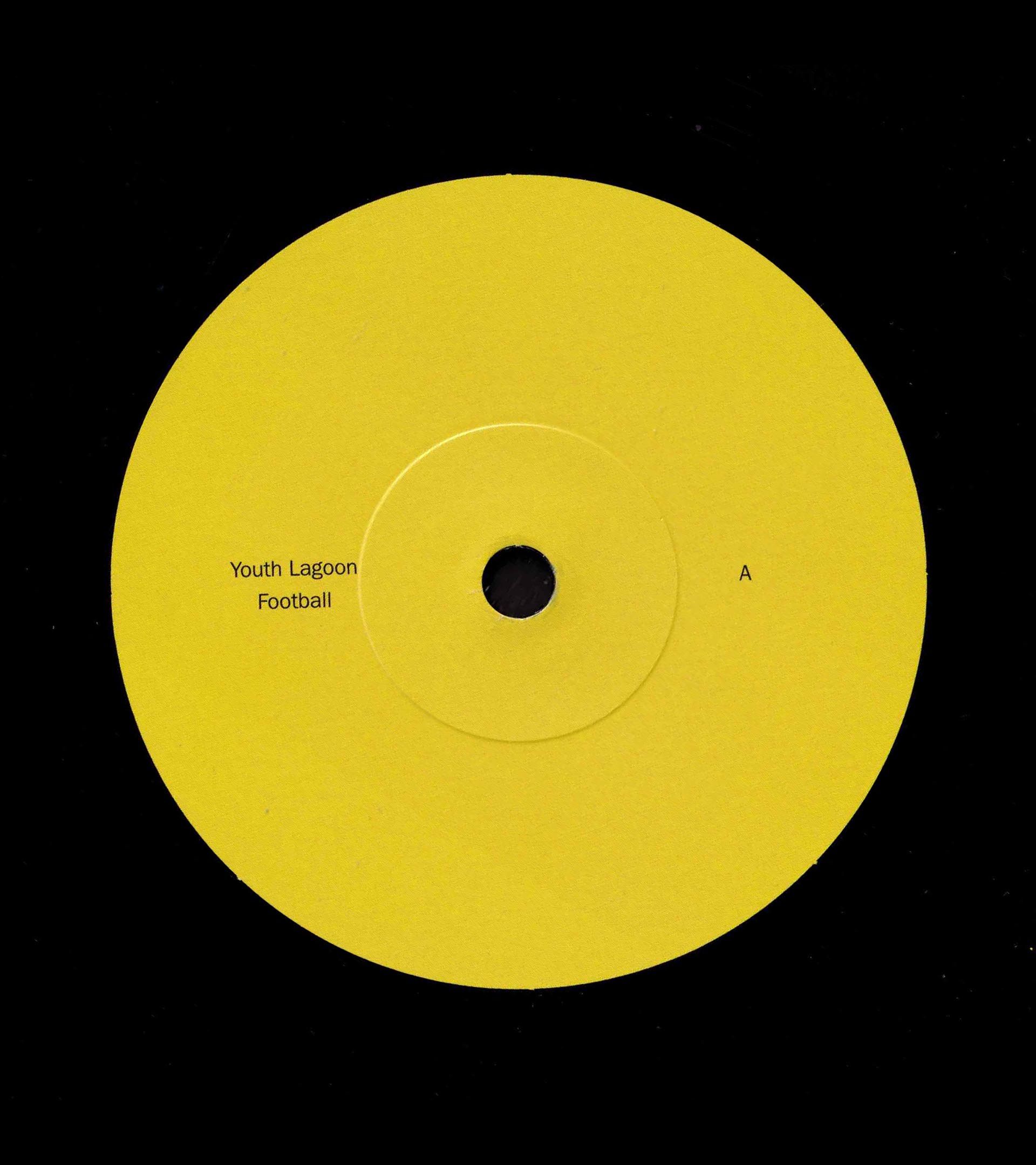 Youth Lagoon 'Football' 7" vinyl: solid yellow label, 'Youth Lagoon Football A,' black background