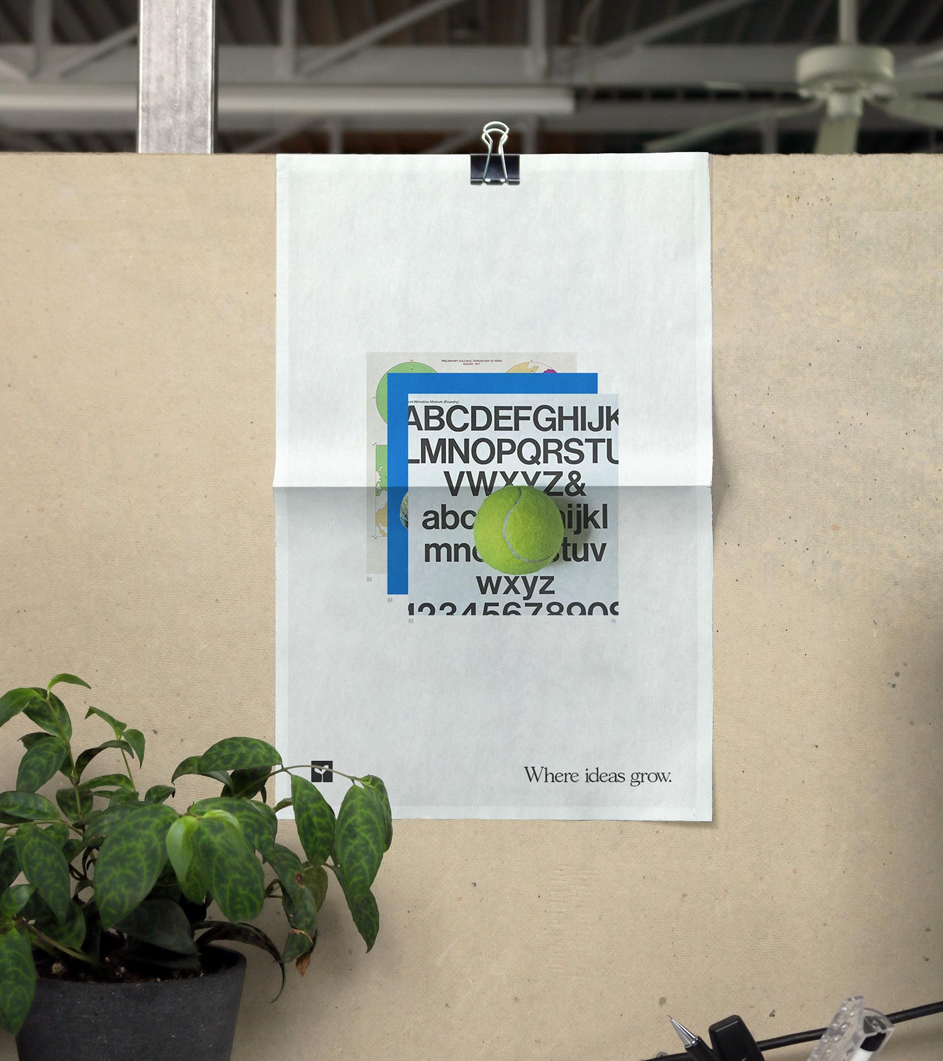 Moss 'Where ideas grow.' poster on studio wall: type specimen with tennis ball and color blocks