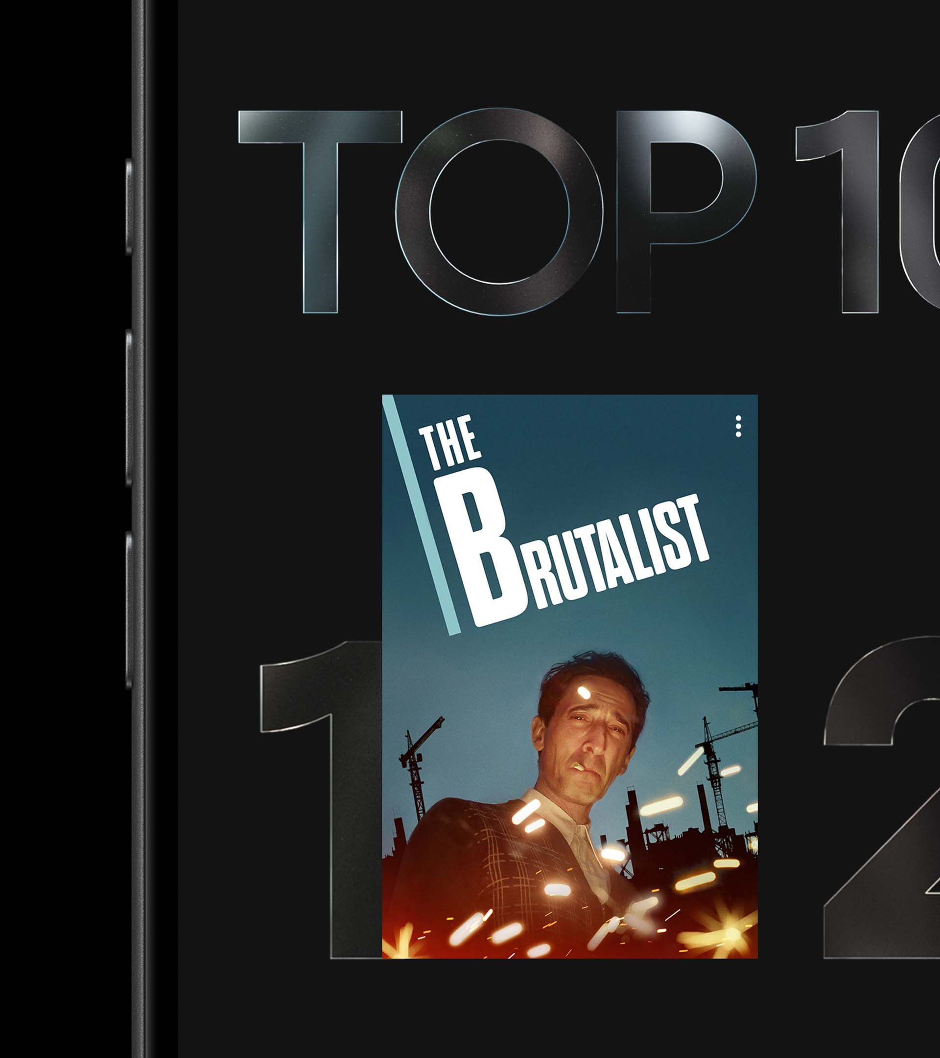 App UI detail: Top 10 chart with The Brutalist ranked #1, large glass numerals framing the title card on black field