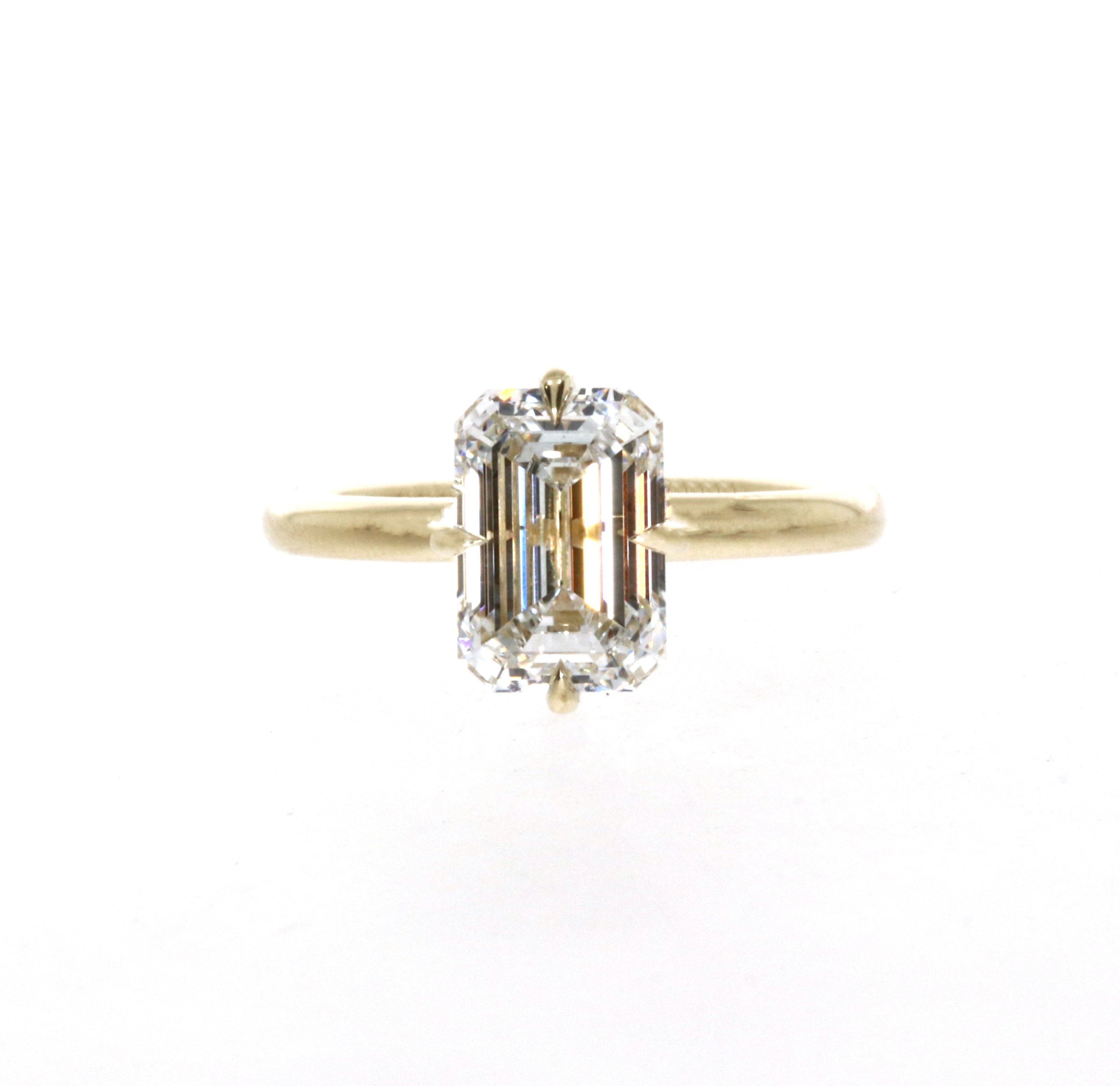 Emerald Plus Ring
