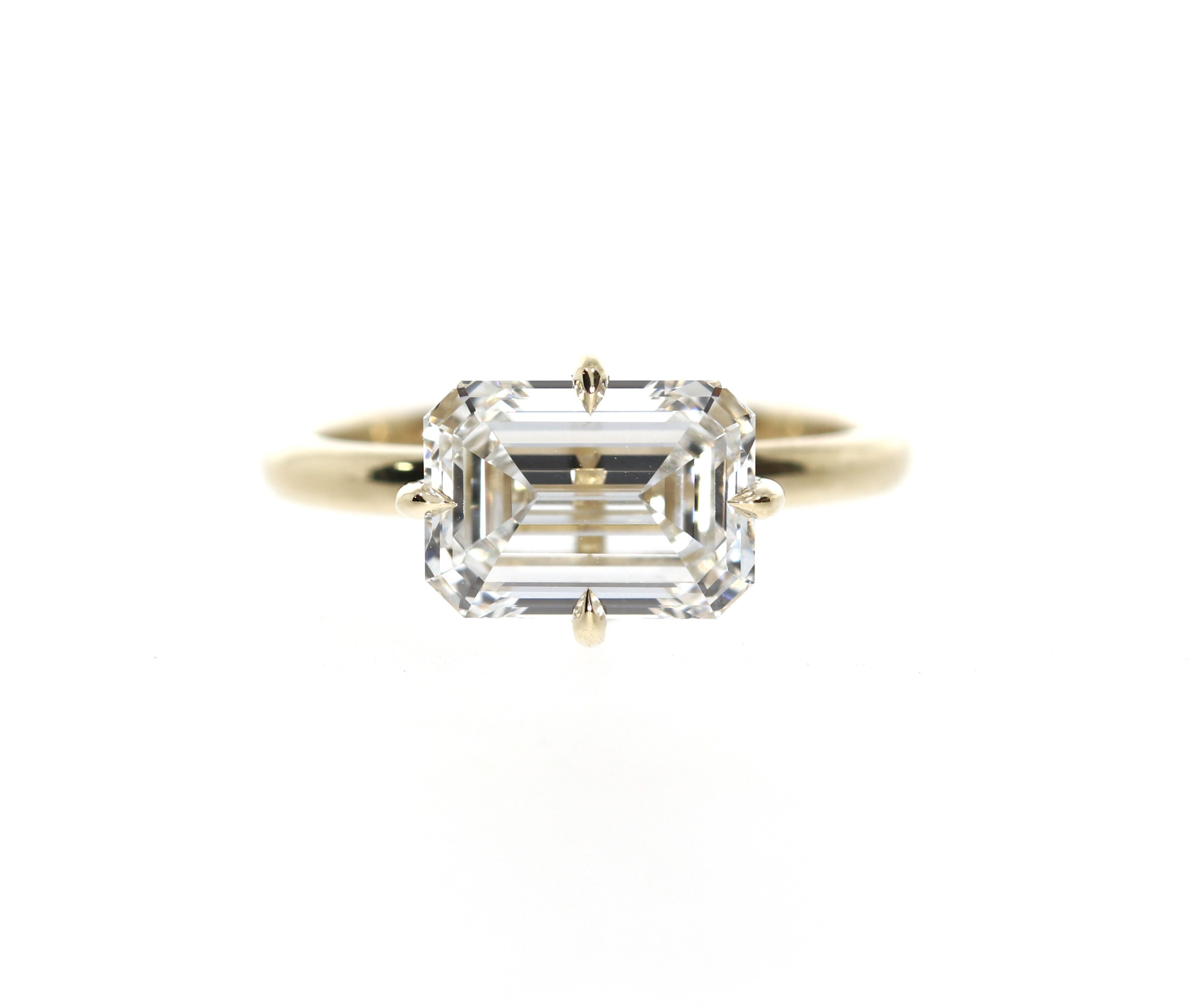 East-West Emerald Plus Ring