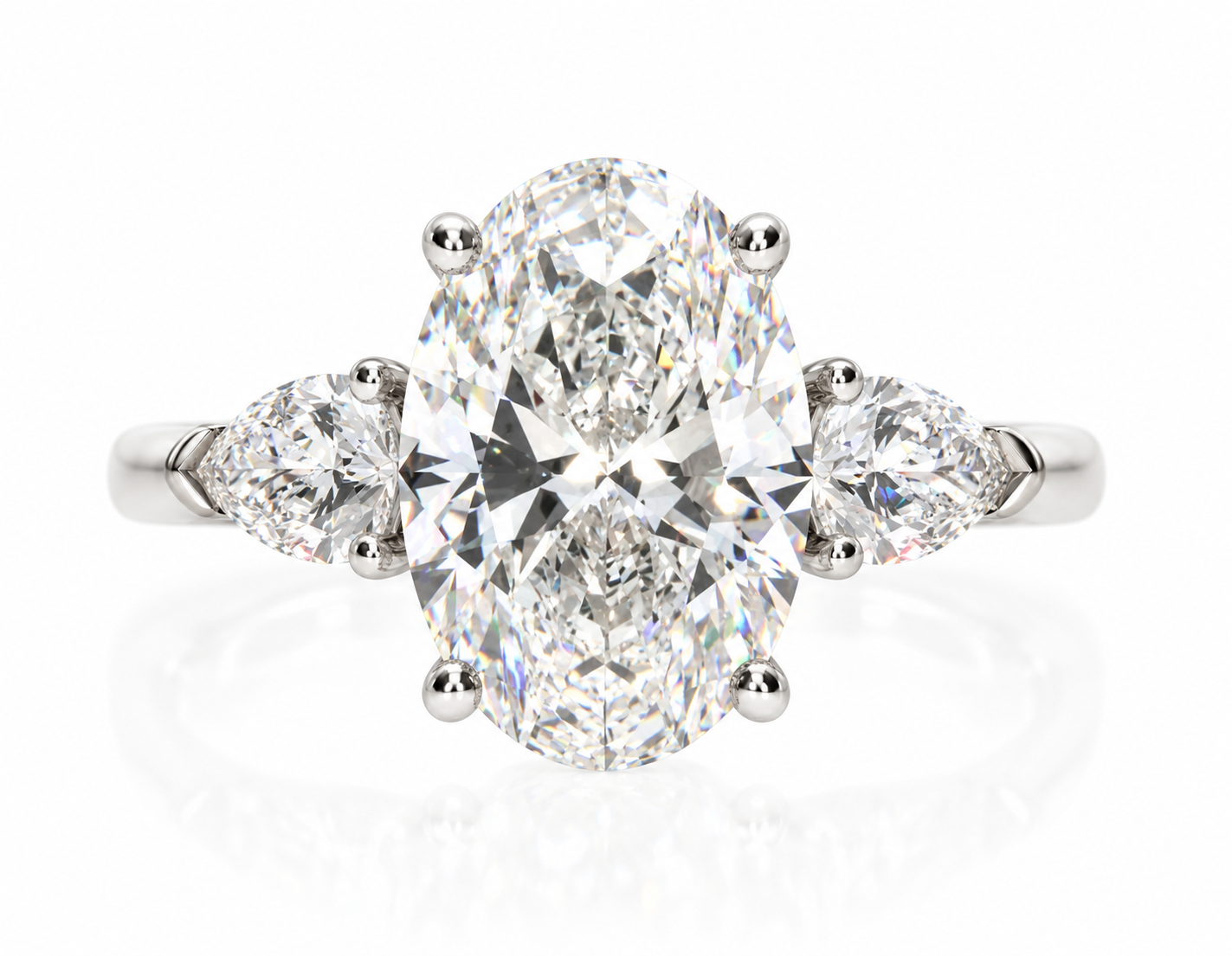 Oval & Pear Three-Stone Ring