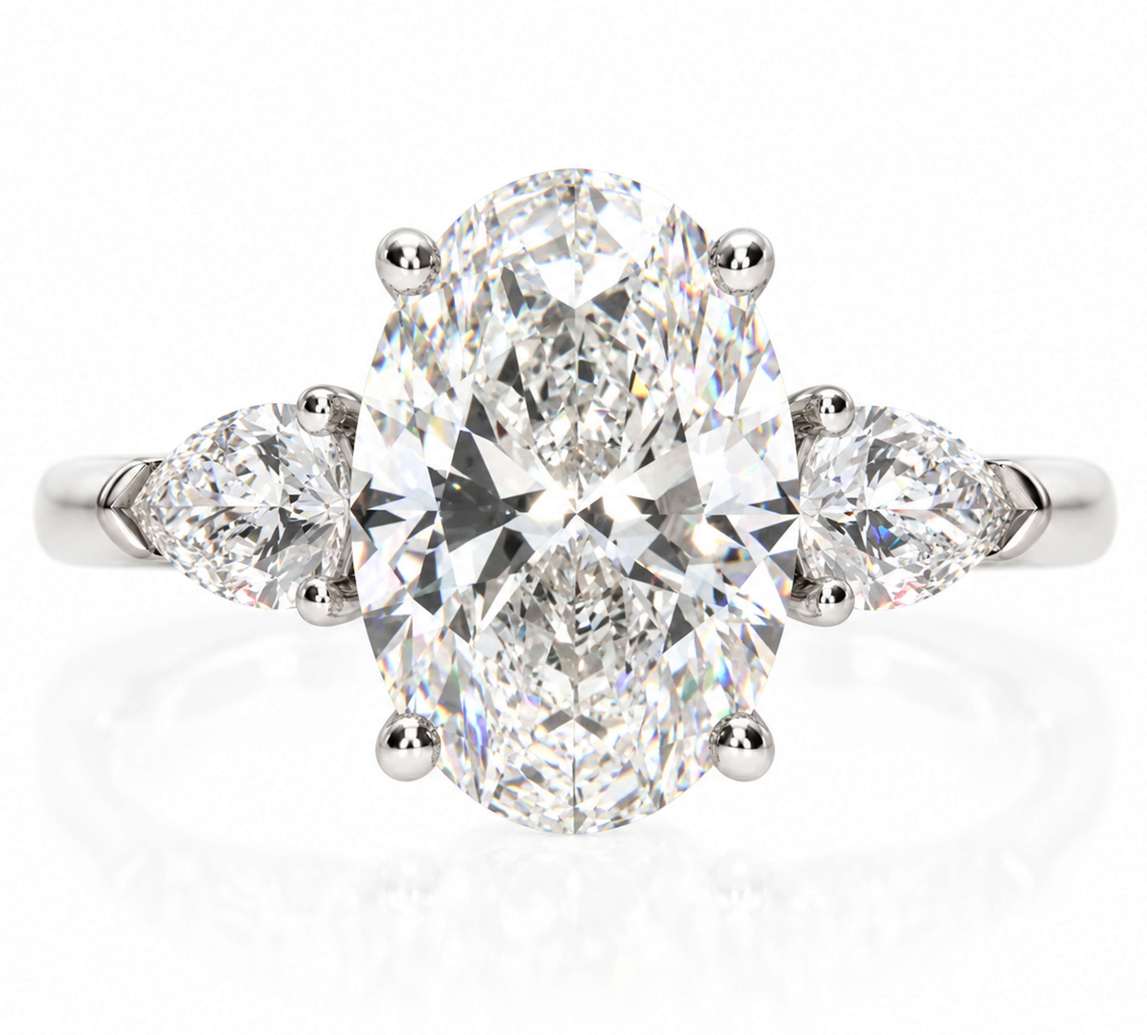 Oval & Pear Three-Stone Ring