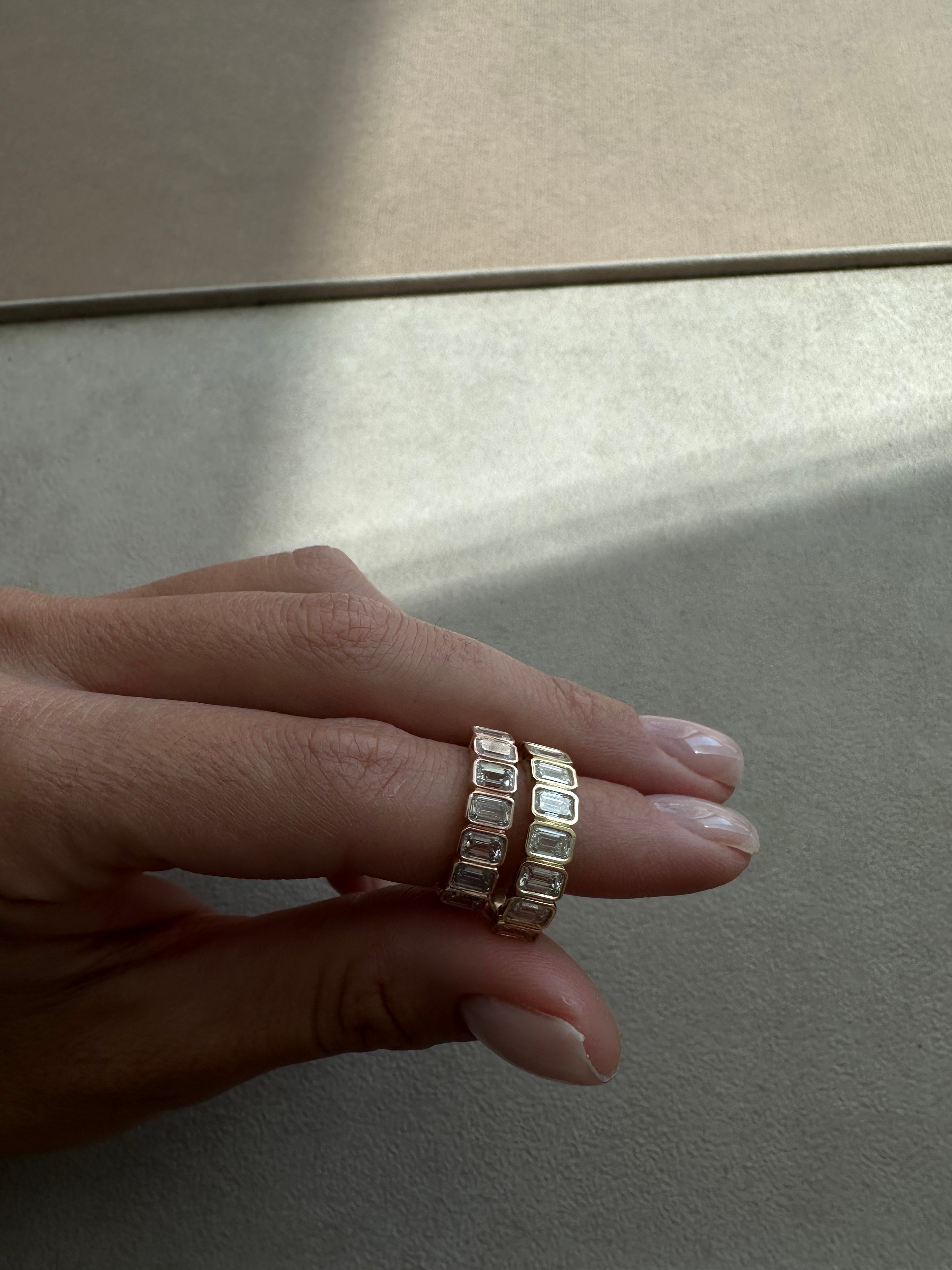 Emerald Half Eternity Bezel Band