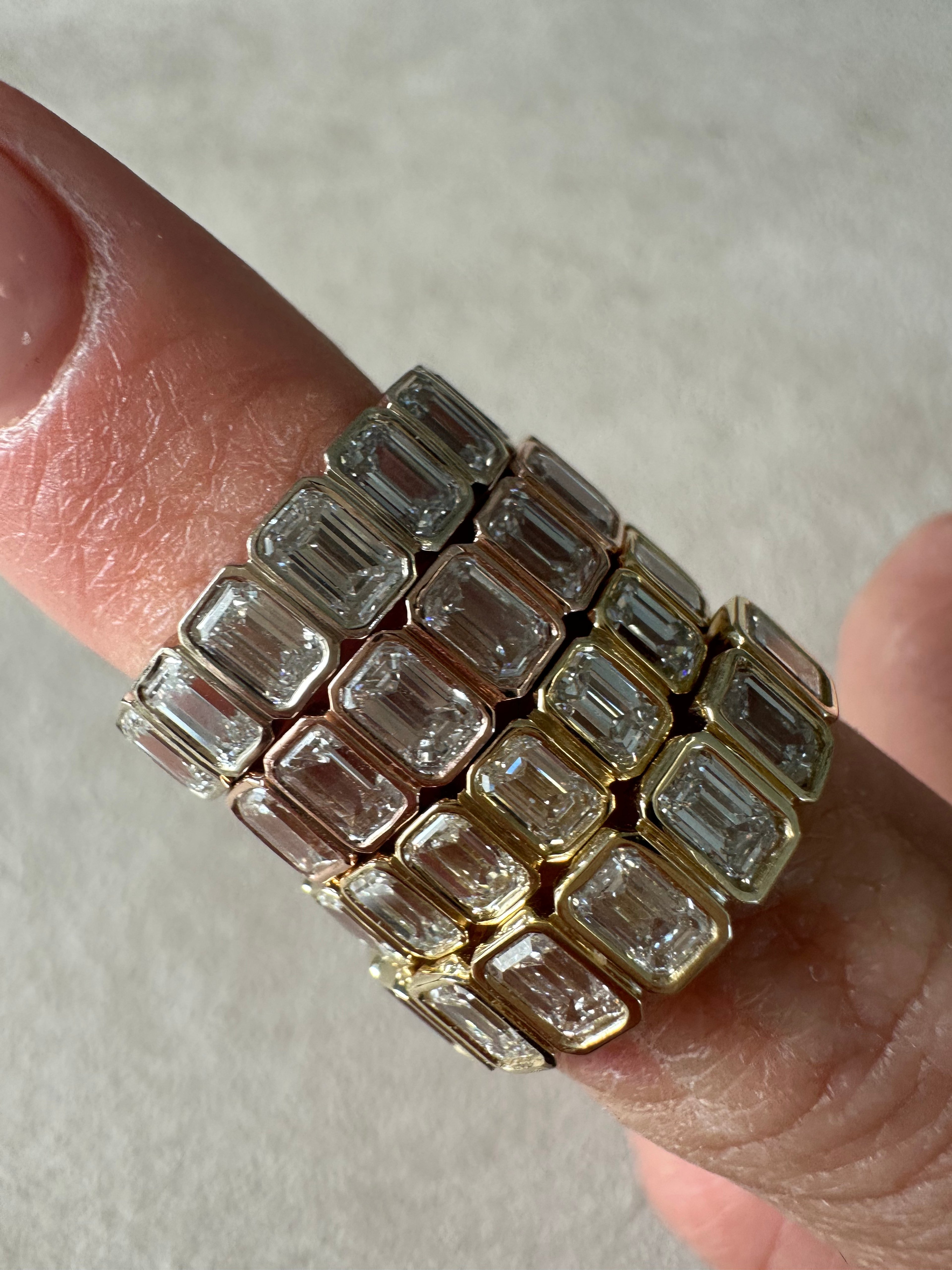 Emerald Half Eternity Bezel Band