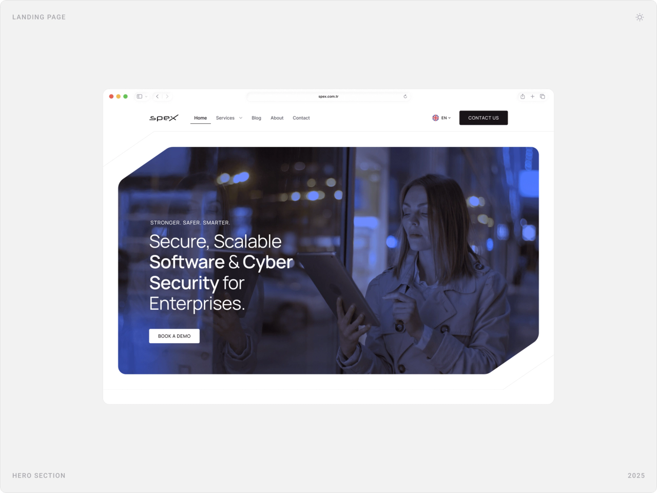 Desktop hero with navigation, language switch, “Contact us” button and a blue-tinted photo cut at 55° corners