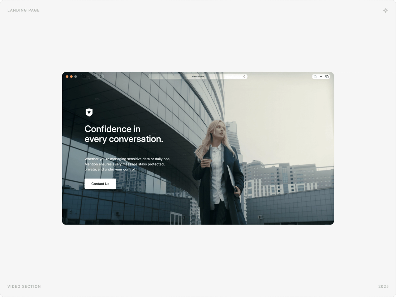 Full-width video section with “Confidence in every conversation.” over a businesswoman outside an office tower and a Contact Us button