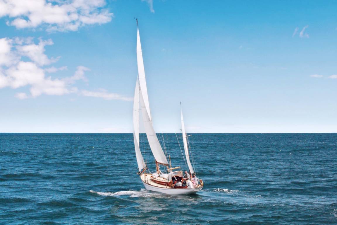 A photo of a sailboat with a tailwind