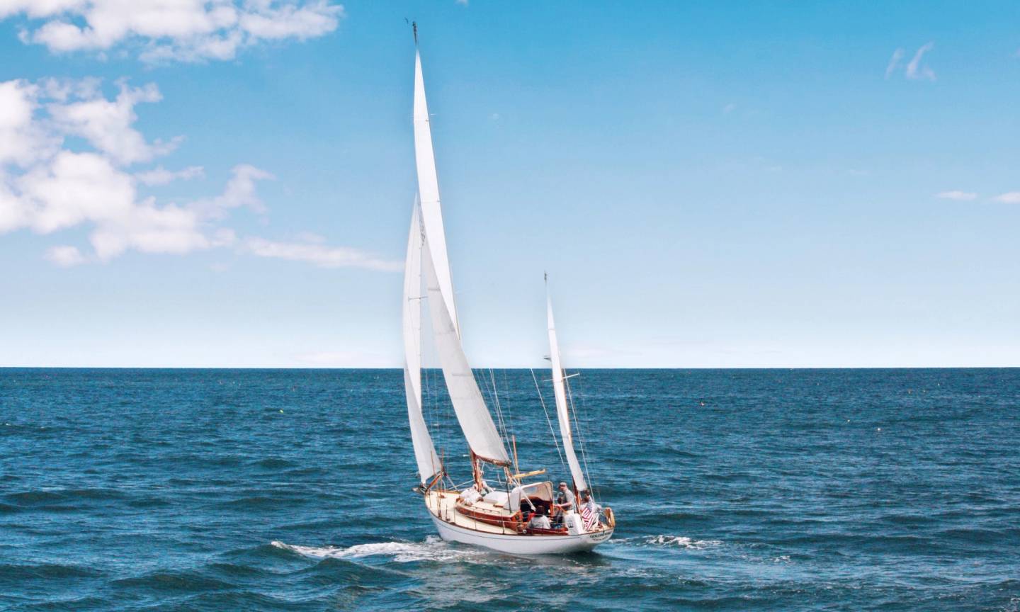 A photo of a sailboat with a tailwind