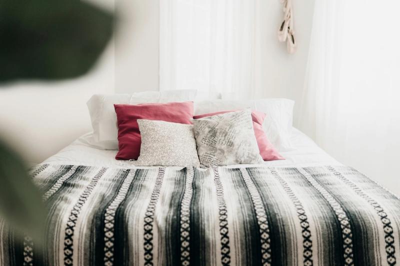 How To Decorate a Large Bedroom: Add Textiles That Make the Room Feel Finished