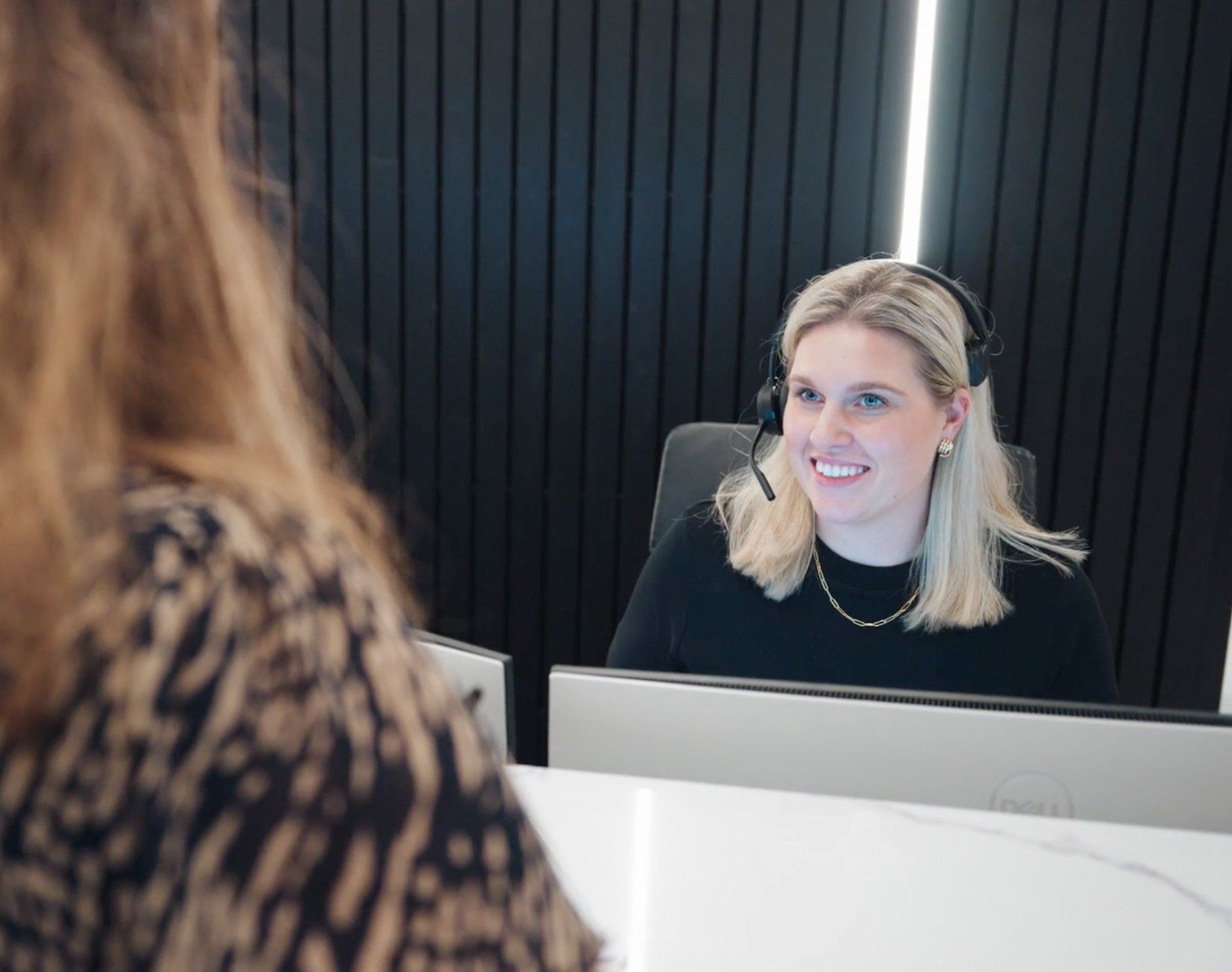 The reception desk at Origia in Collingwood, with an appointment diary open
