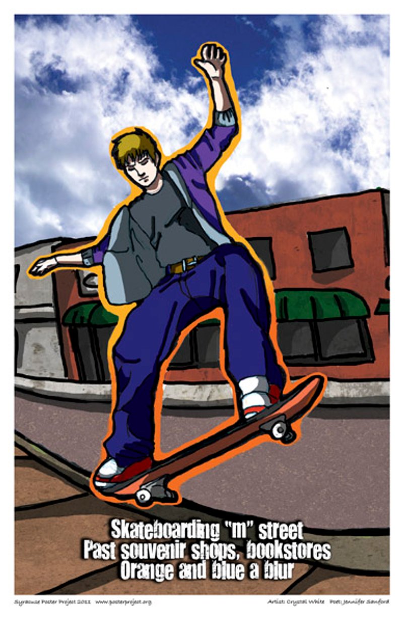 A boy skateboards down an empty street