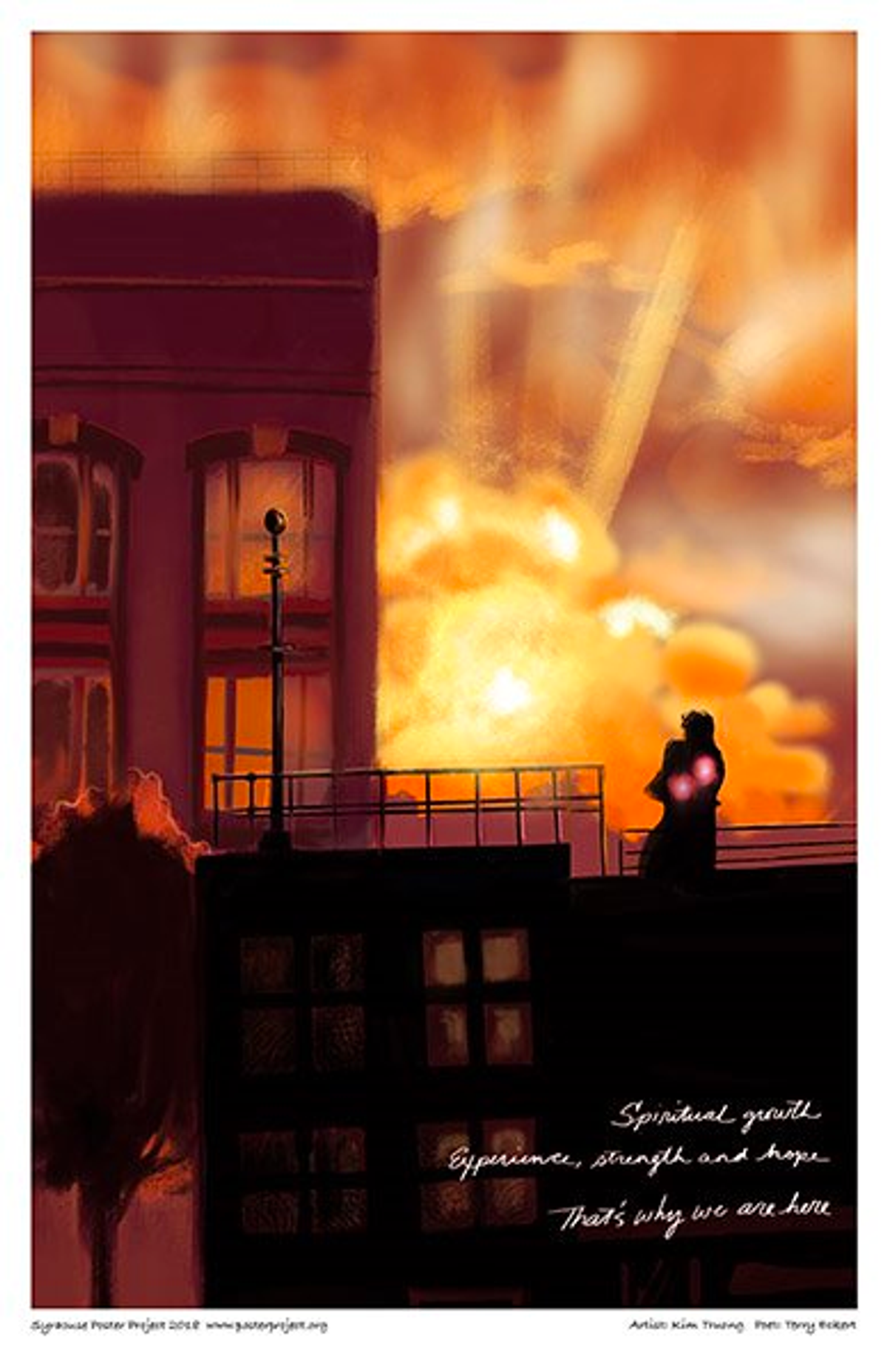 Two people hug on a rooftop at sunset