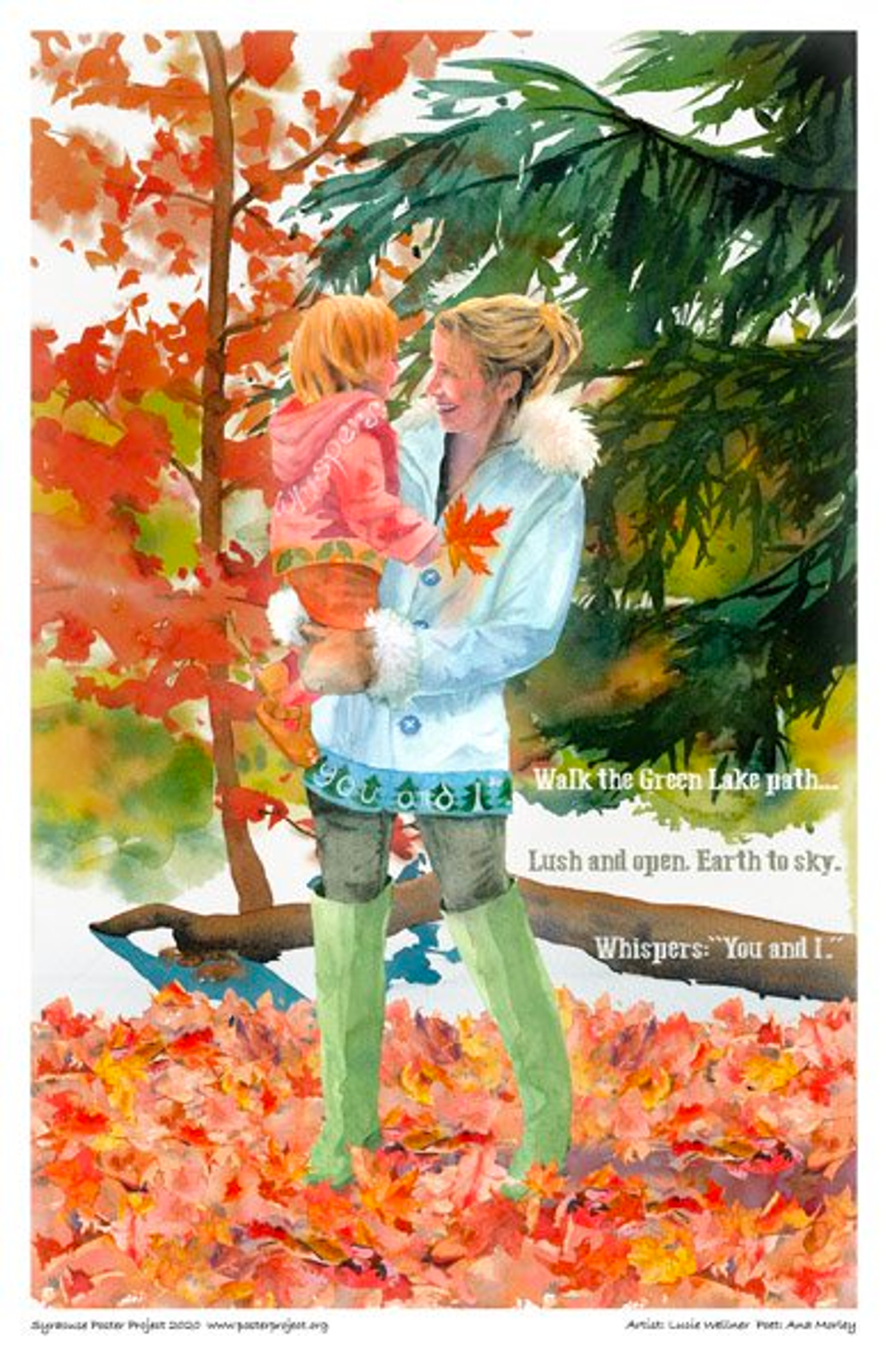 A woman and a child in her arms smile at each other while walking a path covered in fallen autumn leaves
