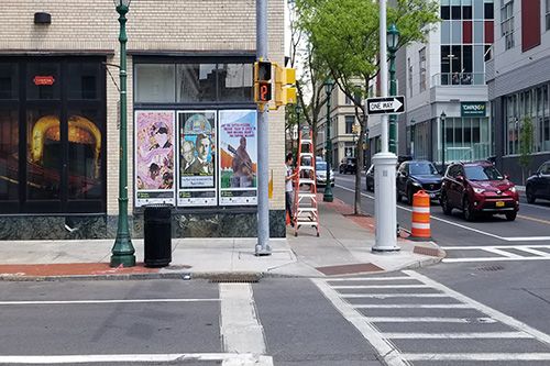 Poster Panel Installation at Landmark Theatre