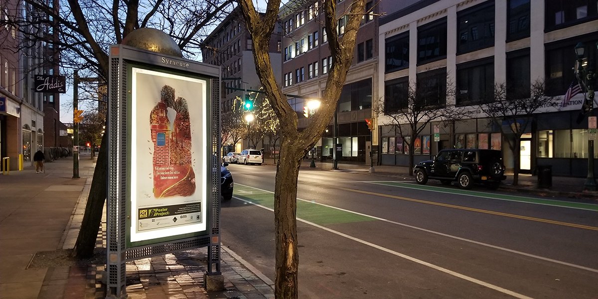 A kiosk near the street surrounded by nightfall