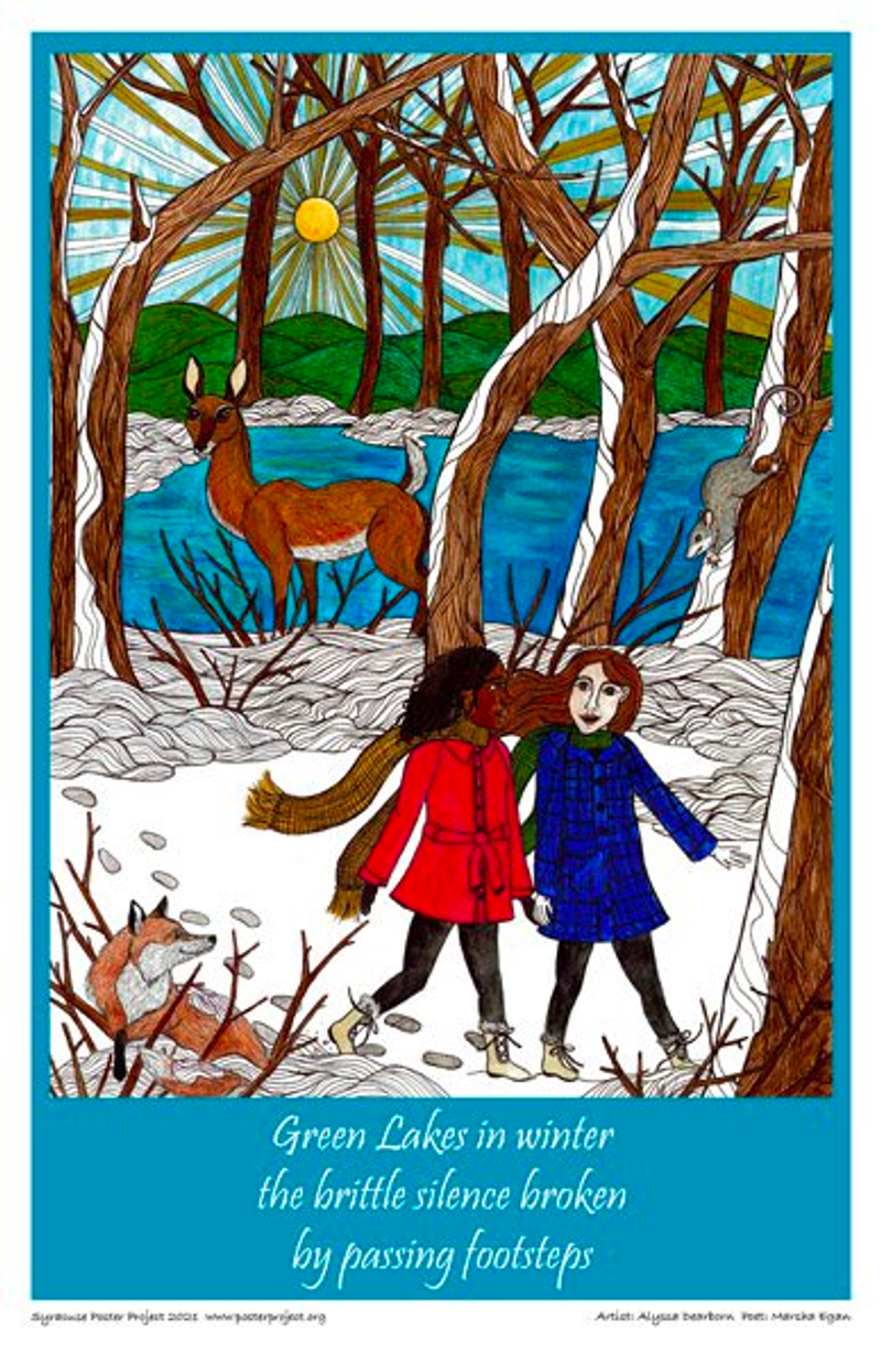 Two people walk through a snowy riverside woods 