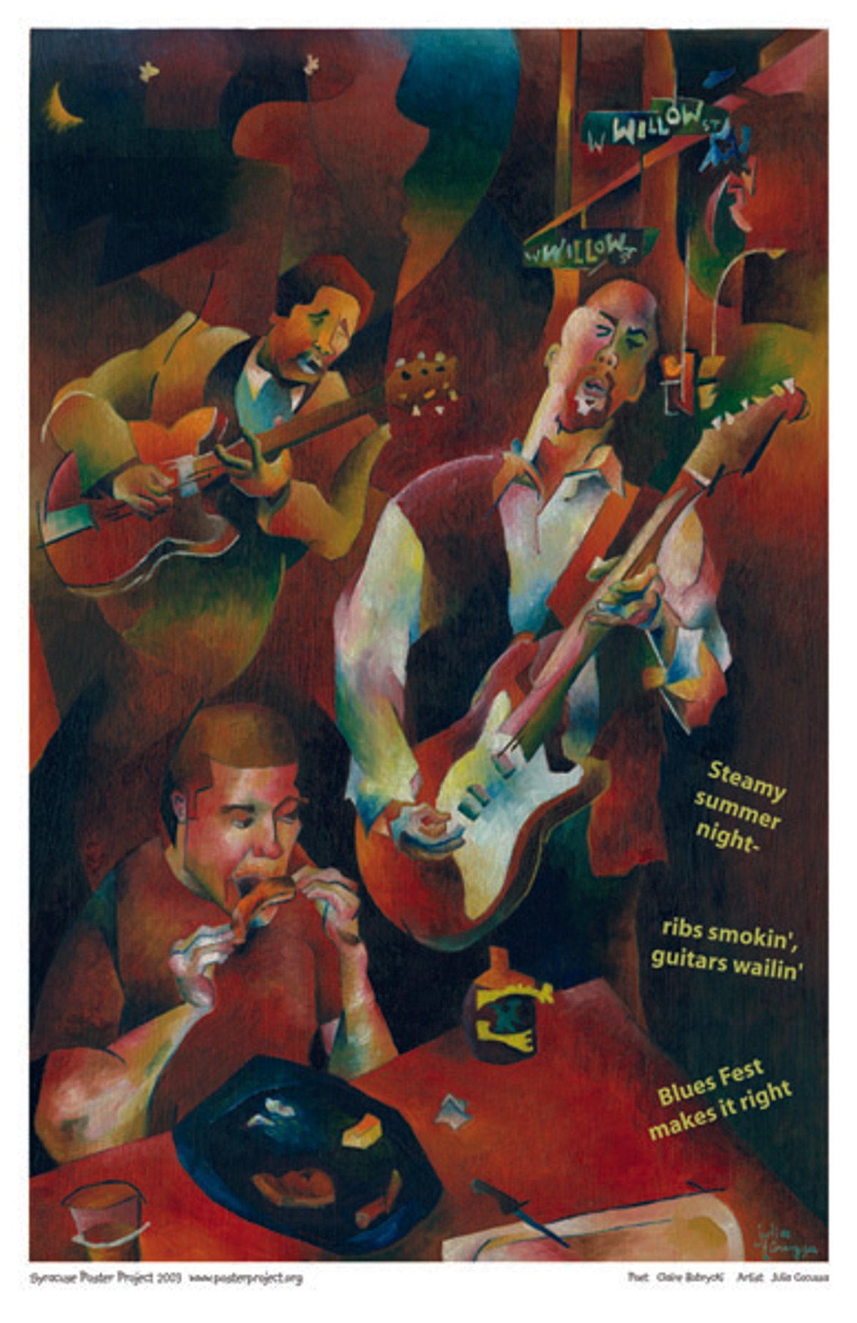 A man eats chicken wings while two blues musicians play the electric bass and guitar nearby