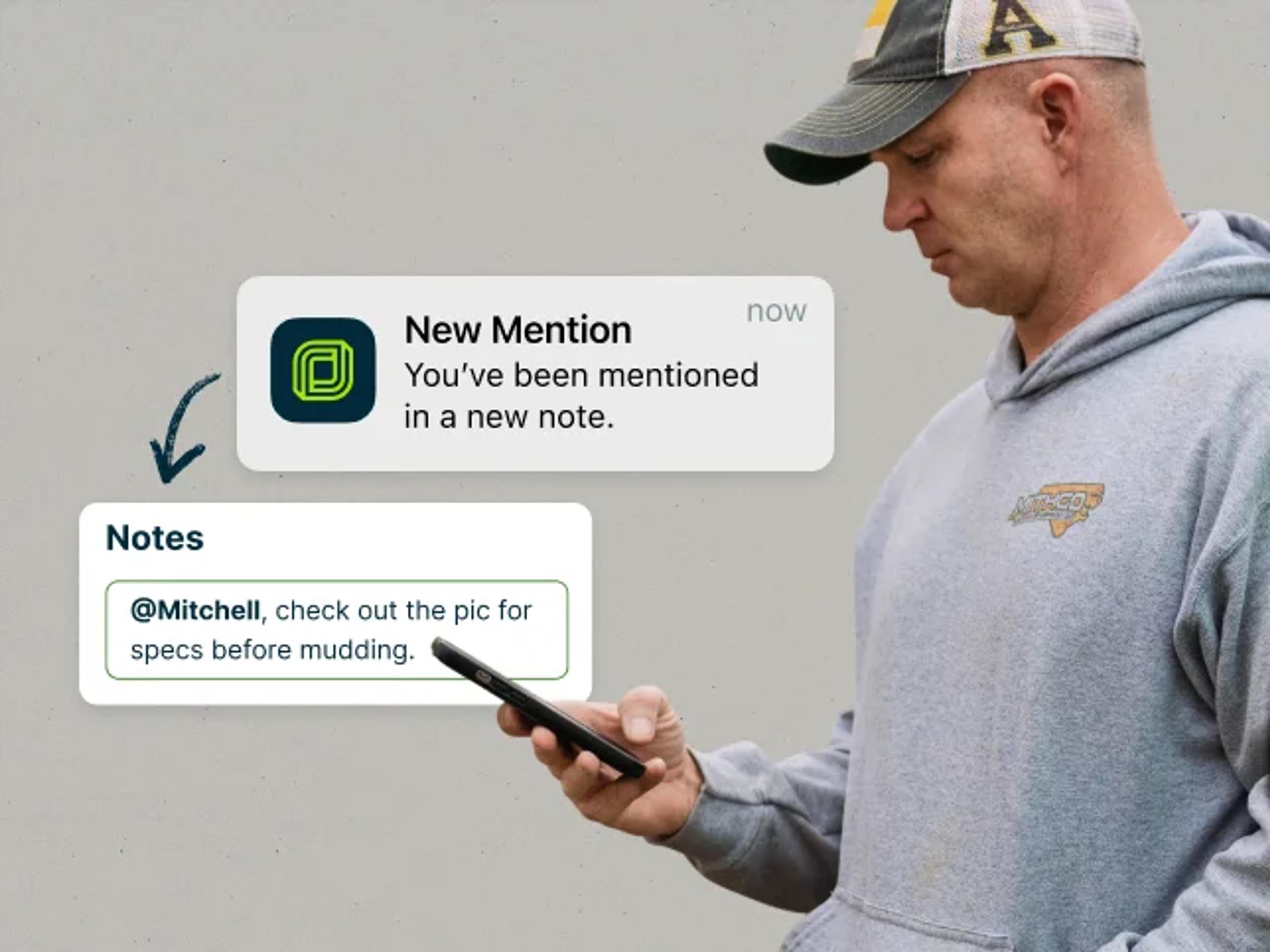 A service professional sending his teammate a message through the Jobber app with an @ mention so they get notified, a feature of Jobber's Field Documentation software