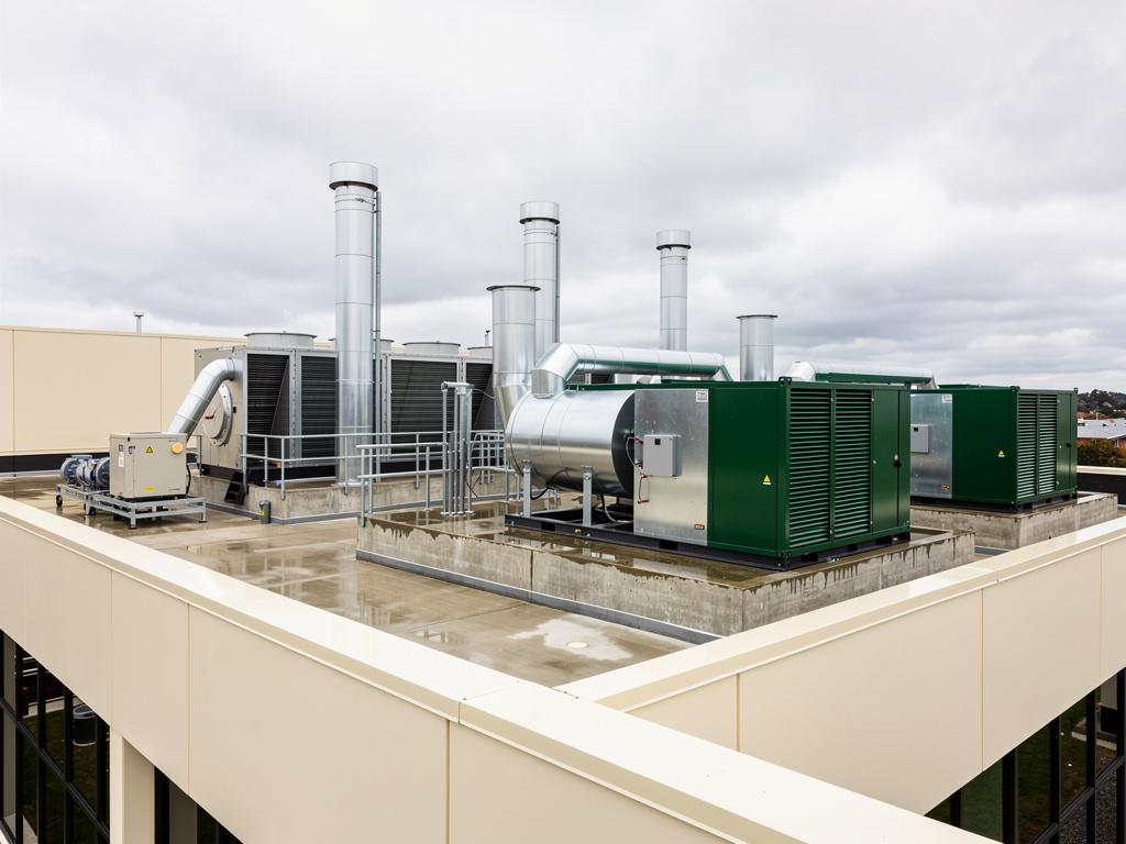 Roof plant and exhaust stacks on a completed laboratory, illustrative of the building type