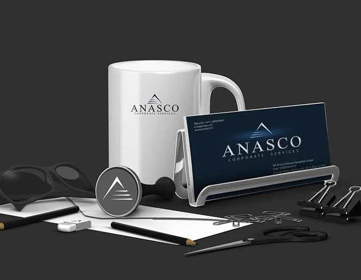 Anasco Corporate Services stationery mockup — mug, business card and badge