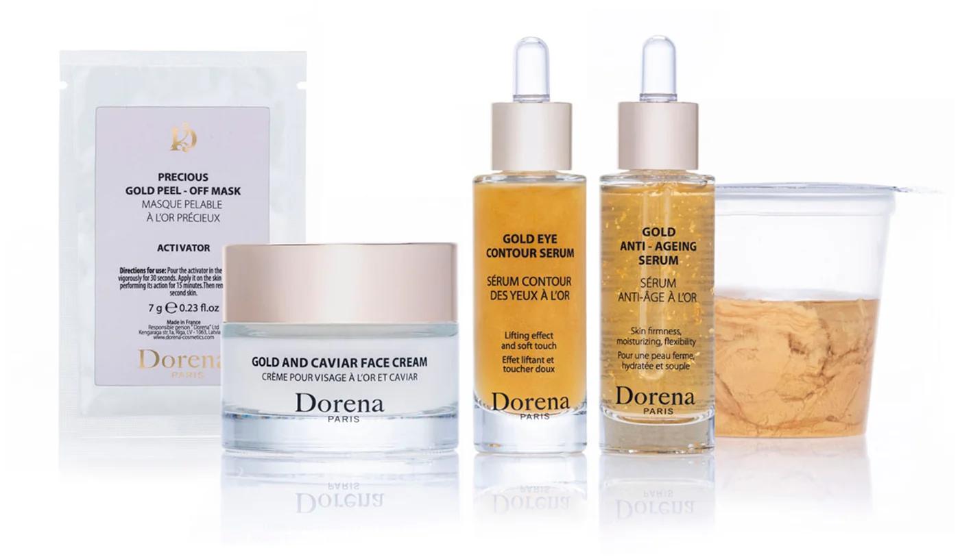 Dorena Paris gold and caviar skincare set with face cream, serums and peel-off mask on a white background