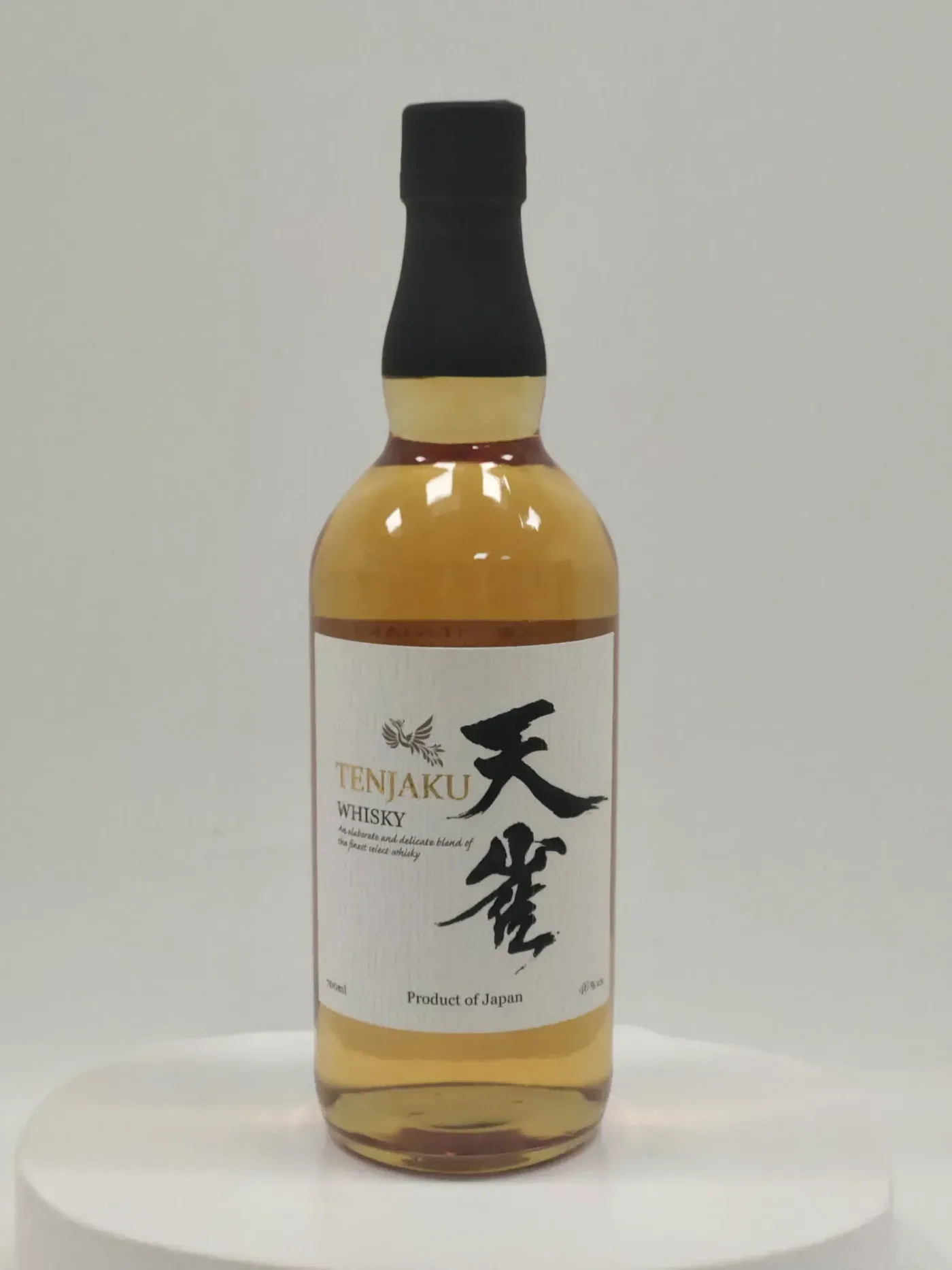 Original studio photo of a Tenjaku Pure Malt whisky bottle on a plain background