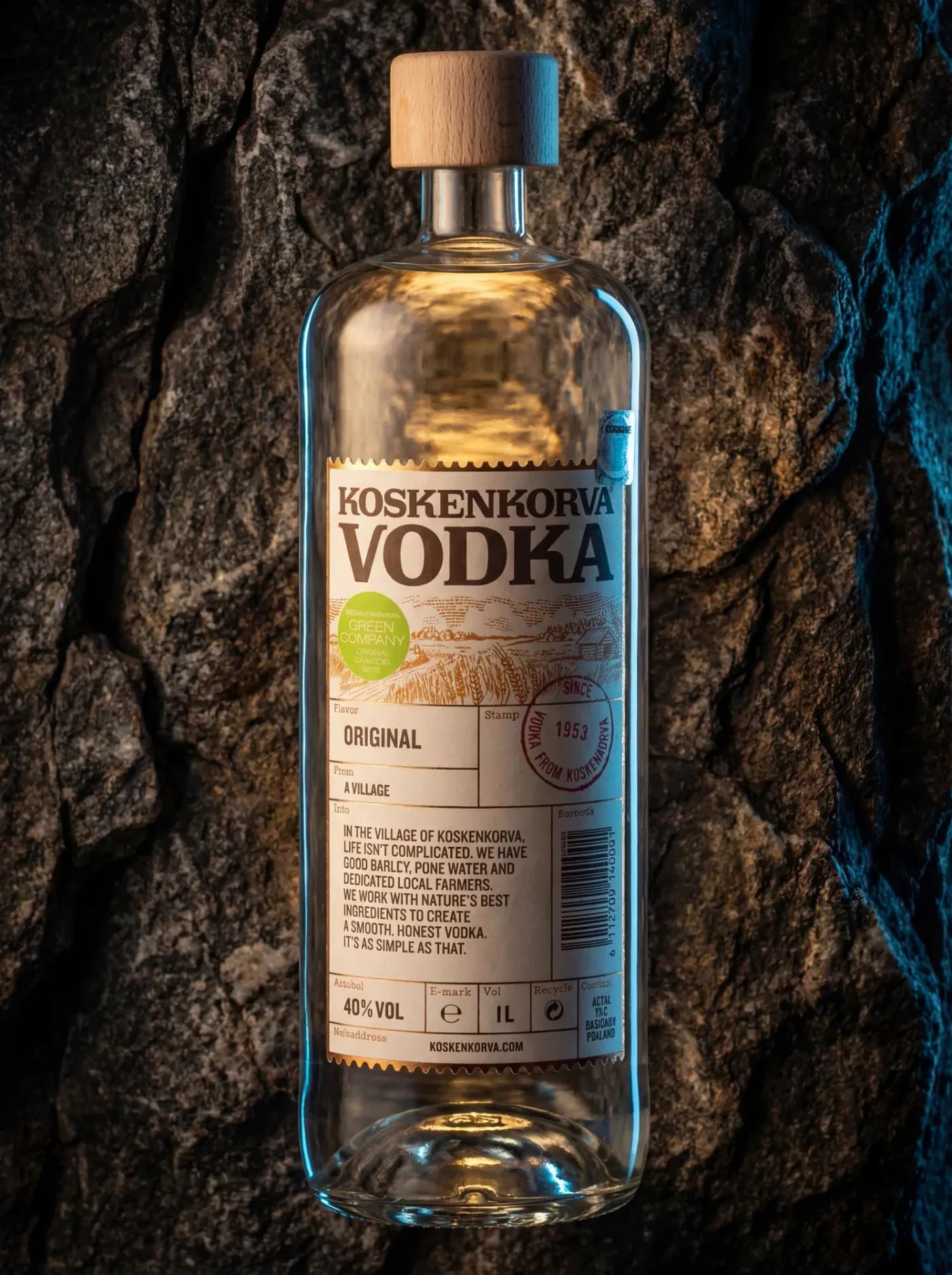 AI-generated advertising photo of a Koskenkorva Vodka bottle lit against a dark rock background