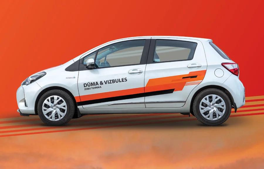 Dūma & Vizbules orange vehicle wrap design
