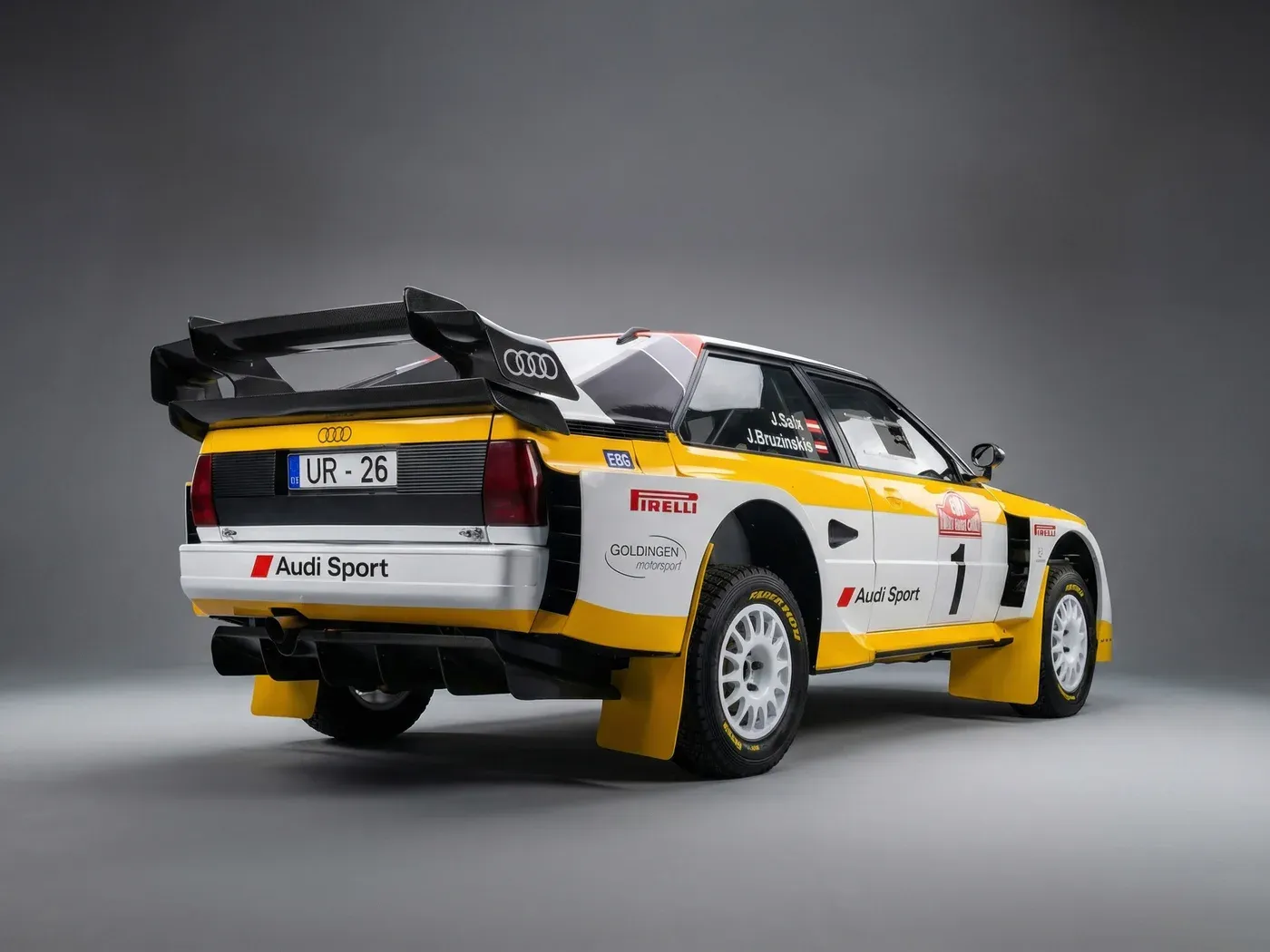 AI-generated studio photo of the rear of the Audi rally car on a clean grey background