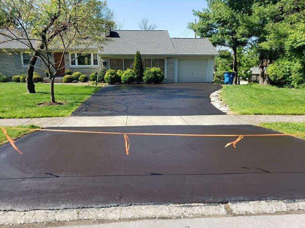 Sealcoating Services Lexington, KY Top Rated Concrete Sealer C&R Asphalt Animals