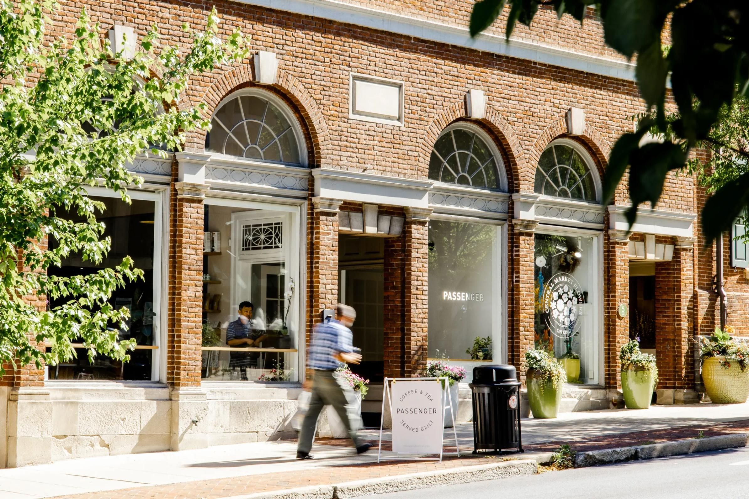 The sun shines outside on the beautiful windows at Passenger's King St. Showroom