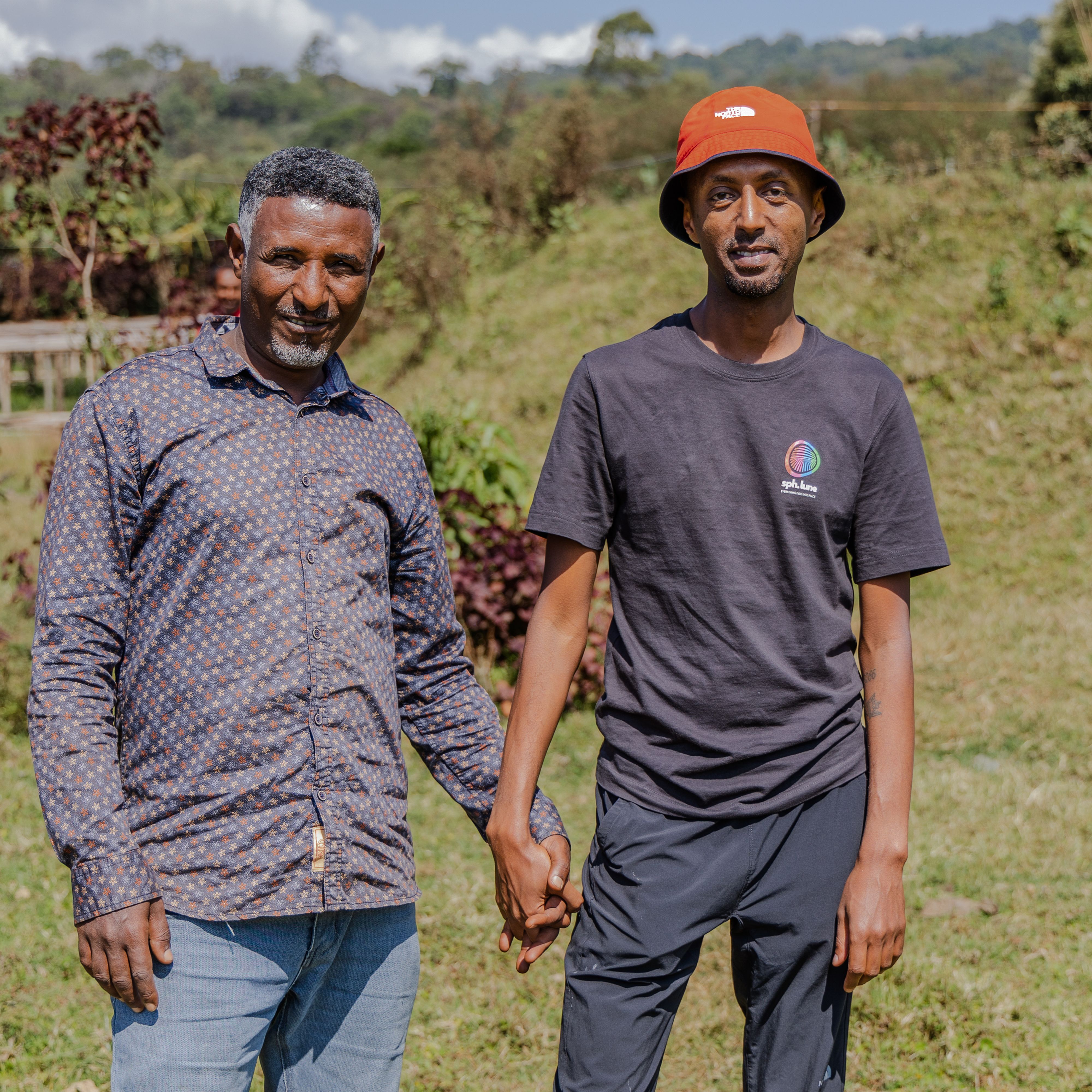 Fikru Ashenafi and Mike Mamo of Addis Exporter pose for photo