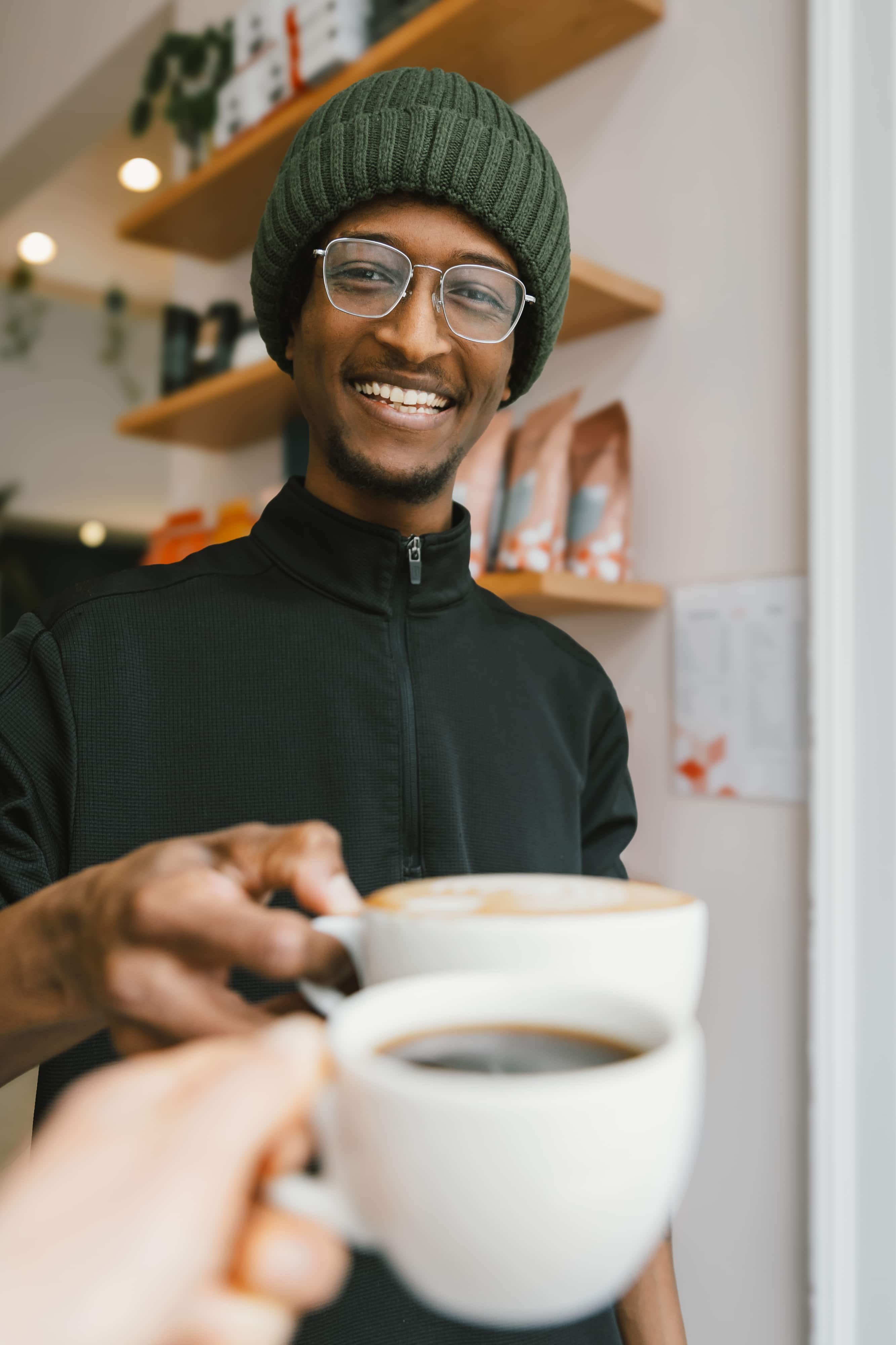 Passenger's barista enjoys a cup with a guest