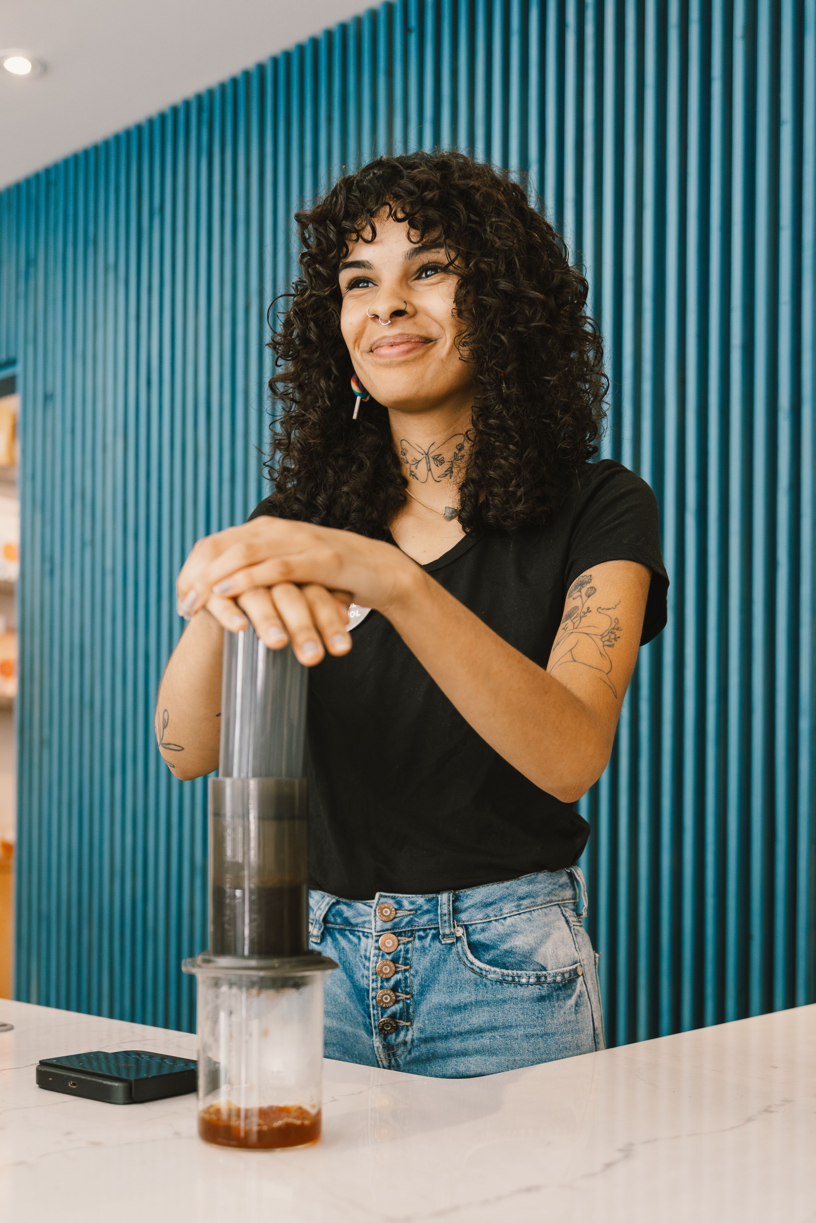 A Passenger Barista making an aeropress for a guest