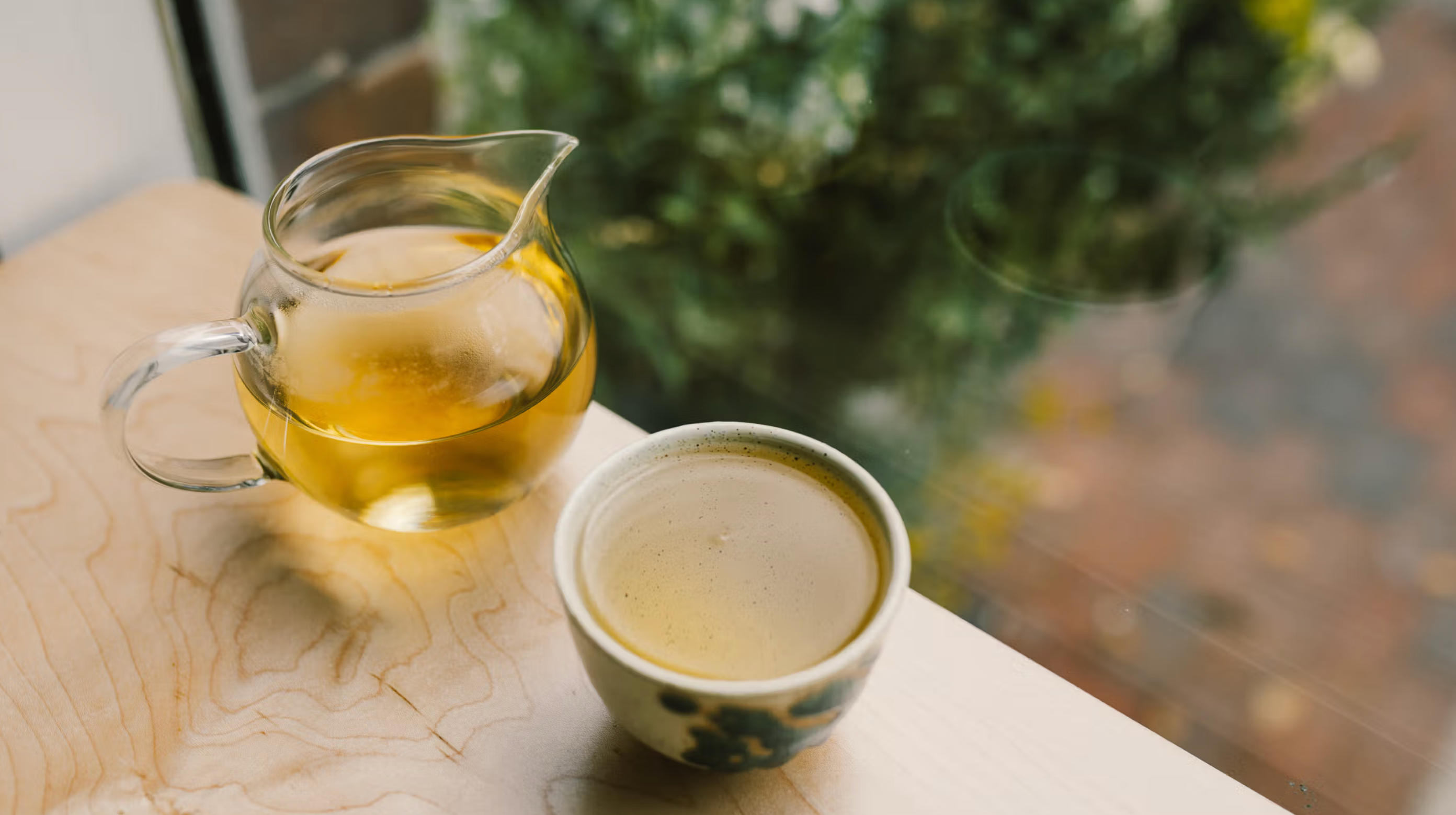 A cup of white tea on a bar at our cafè