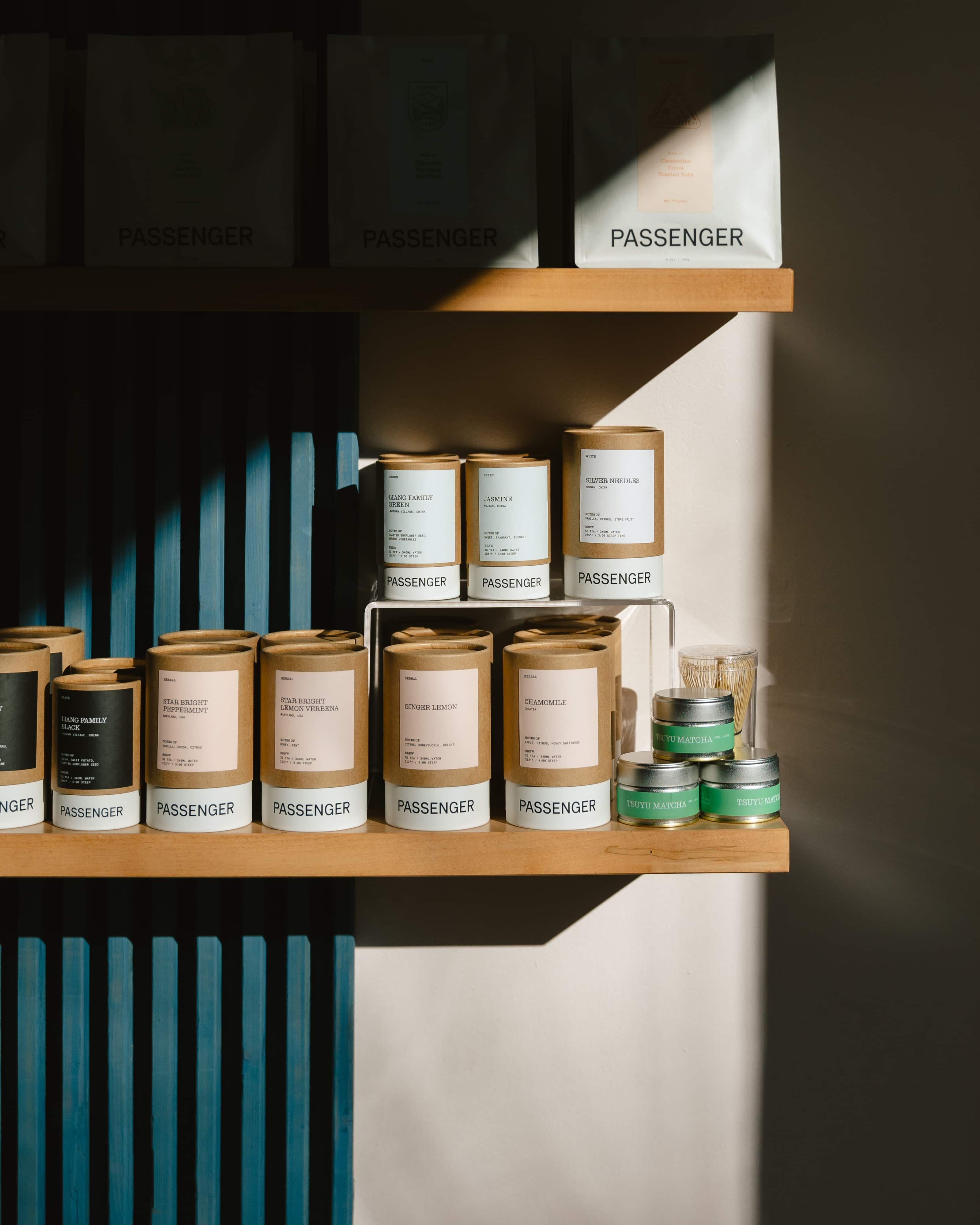 Tea tubes on a retail shelf in the sunlight